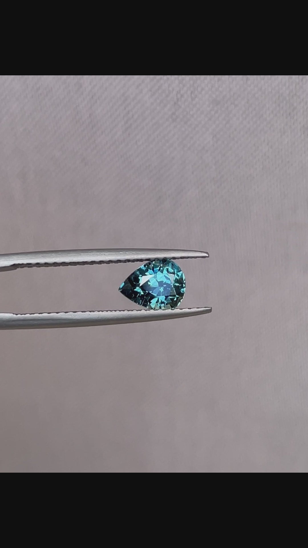 teal blue green parti sapphire pear drop cut gem 