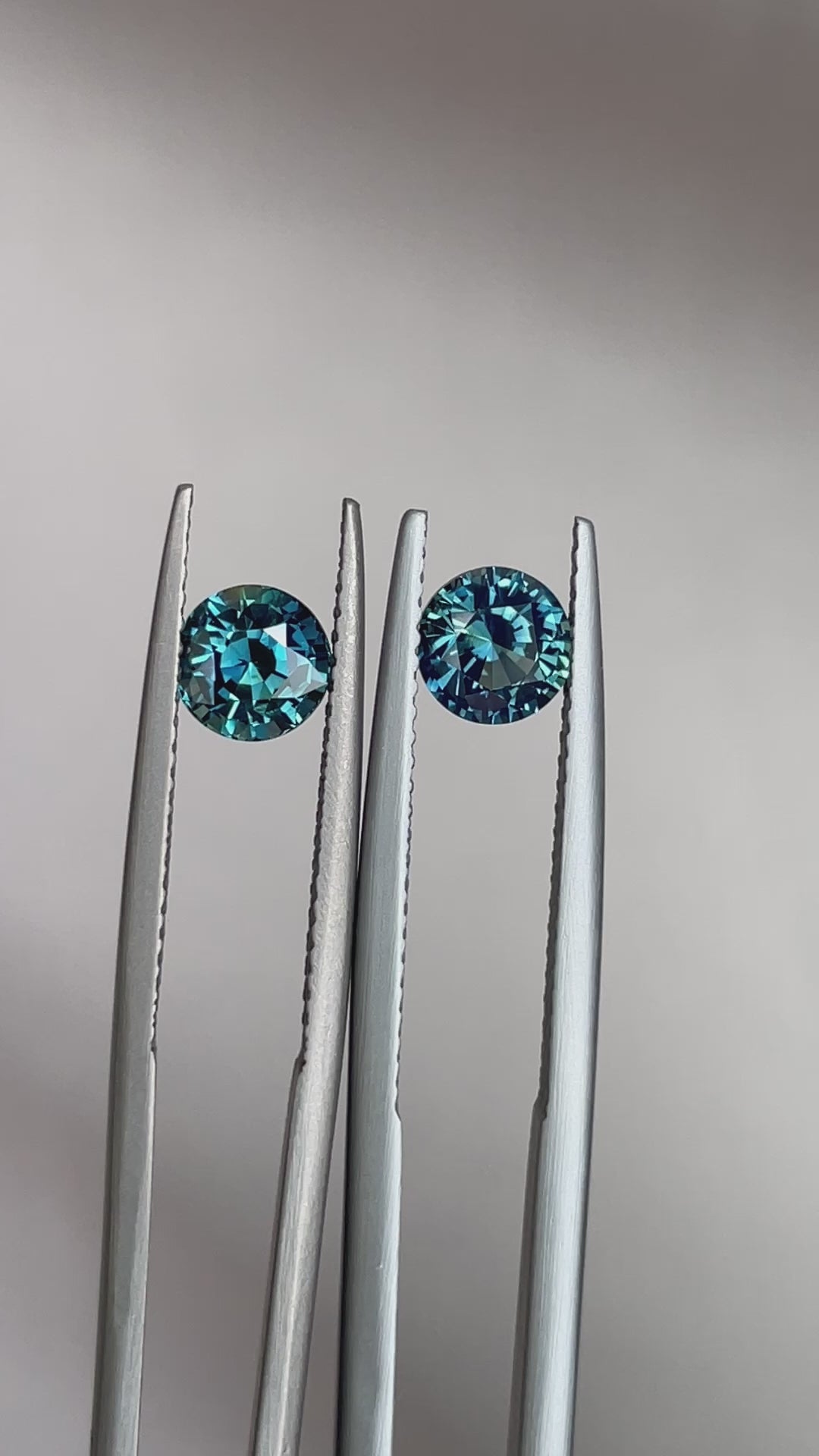 Blue green teal sapphire round pair