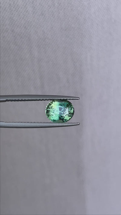 teal blue green parti sapphire oval cut gem 