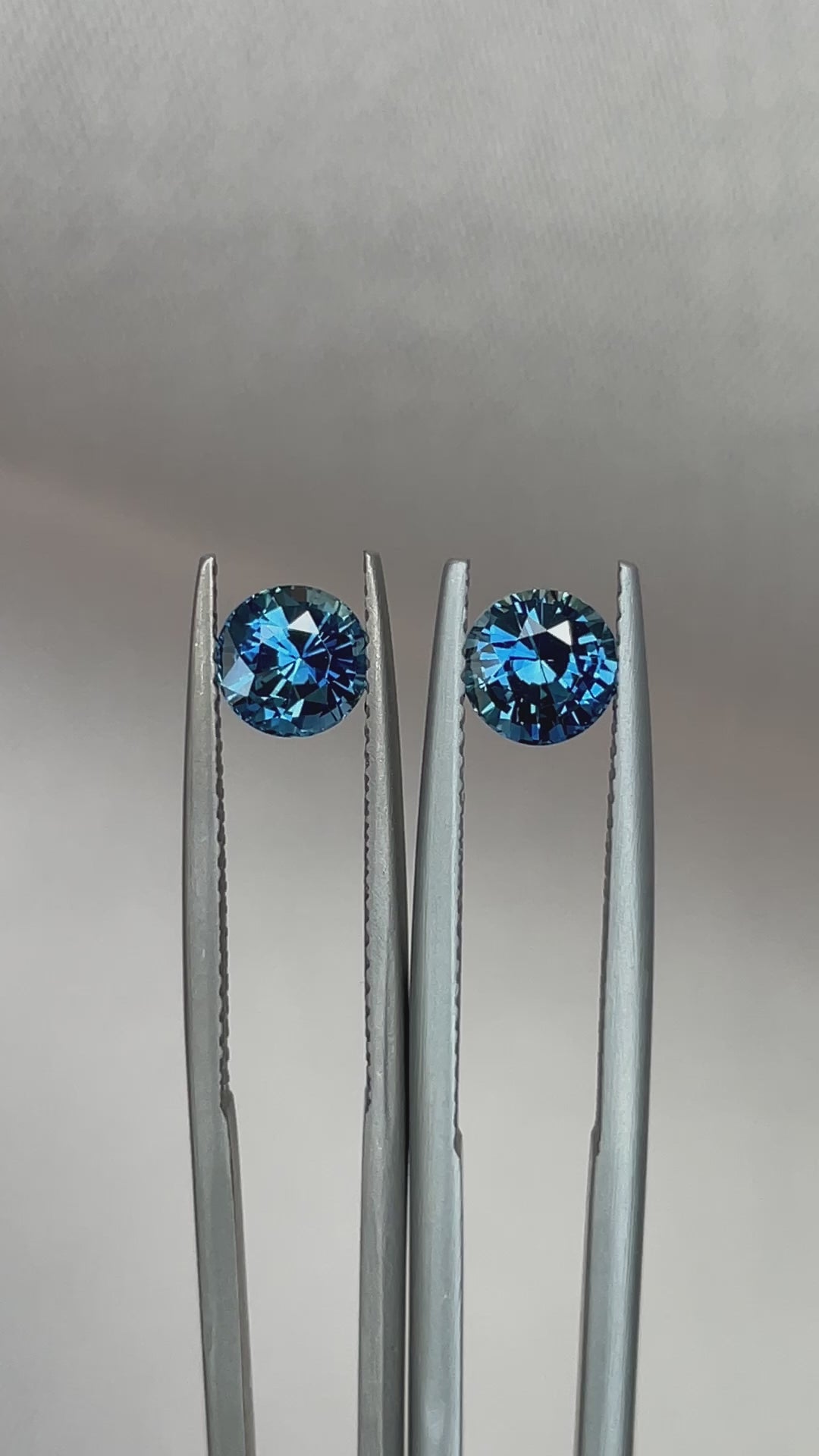Blue green teal sapphire round pair