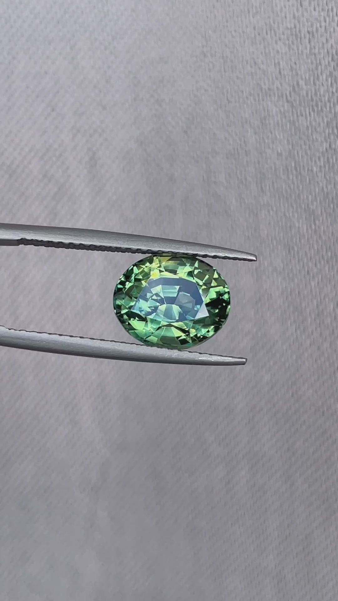 teal blue green parti sapphire oval cut gem 