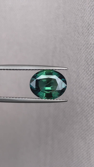 teal blue green parti sapphire oval cut gem 