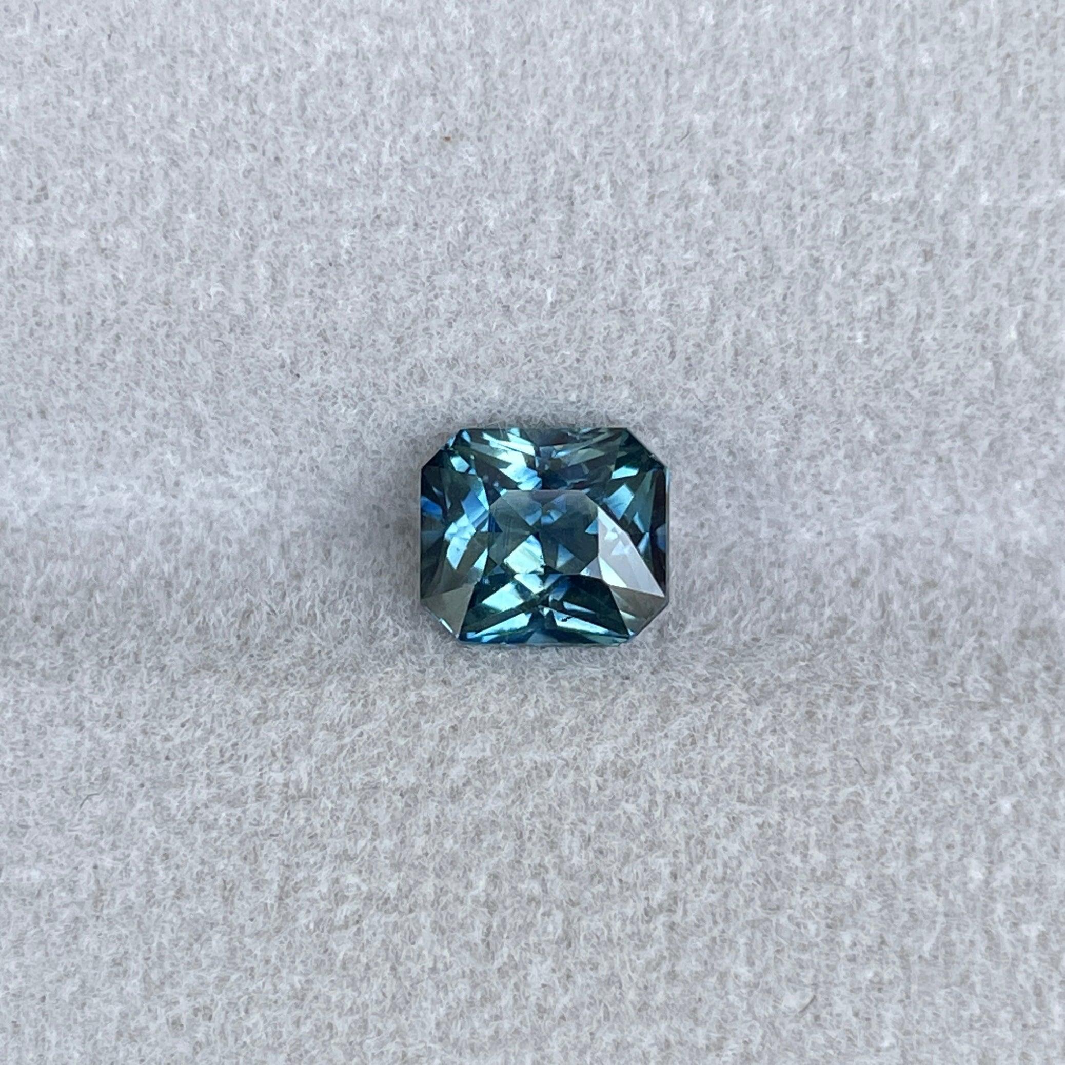 1.76 Carat Teal Sapphire Radiant cut. VVS Clean