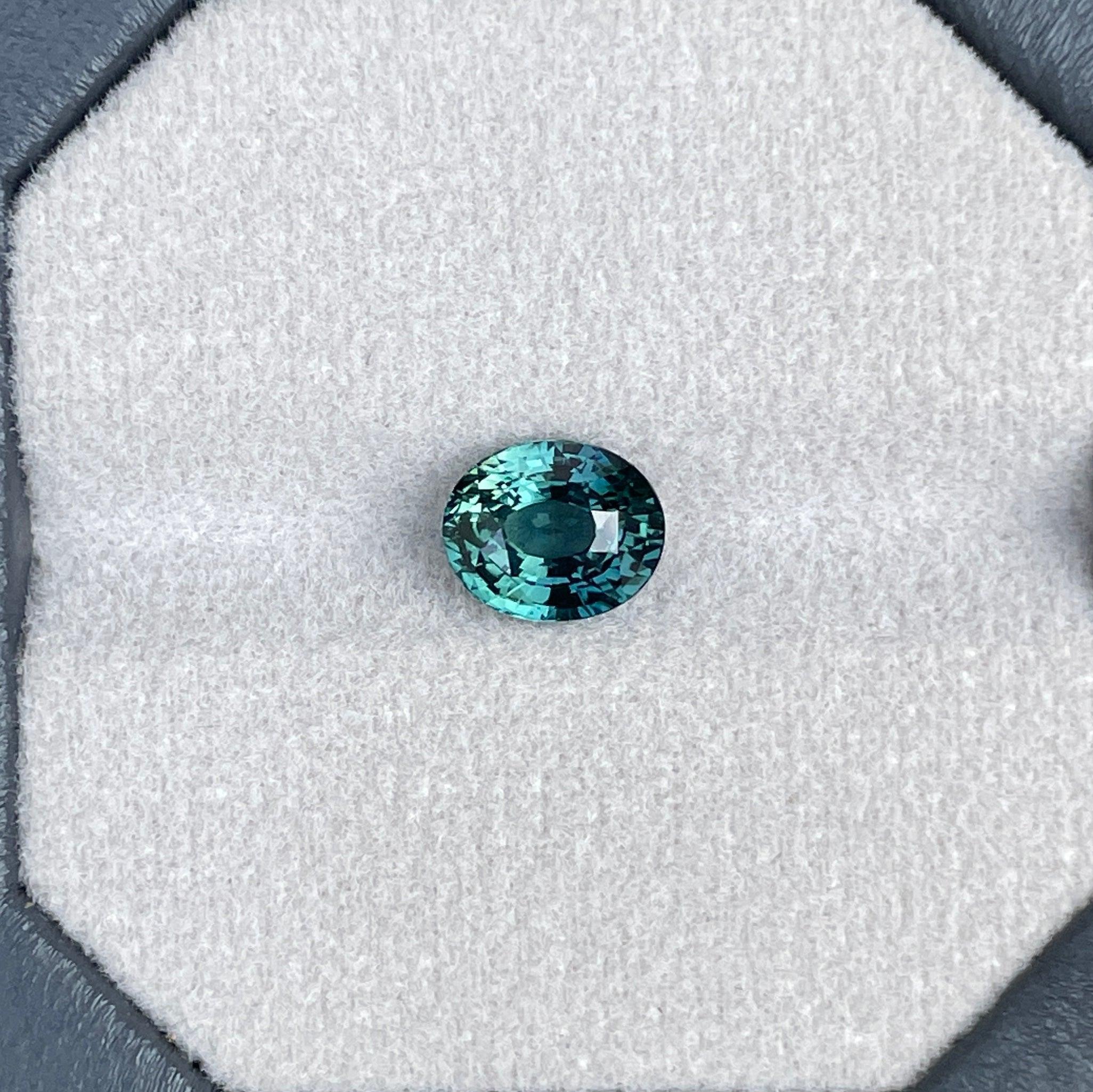 teal blue green parti sapphire oval cut gem 