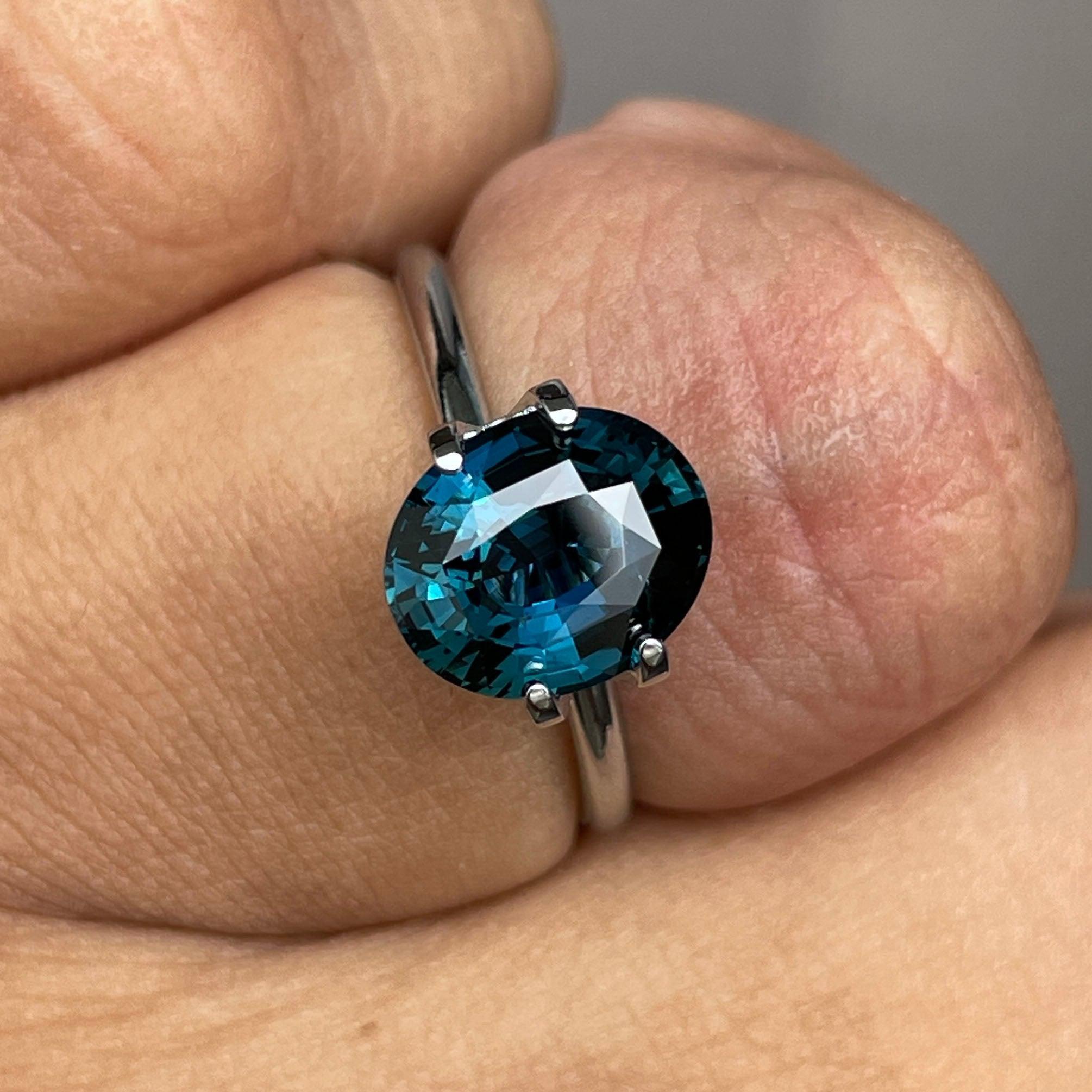 teal blue green parti sapphire oval cut gem 