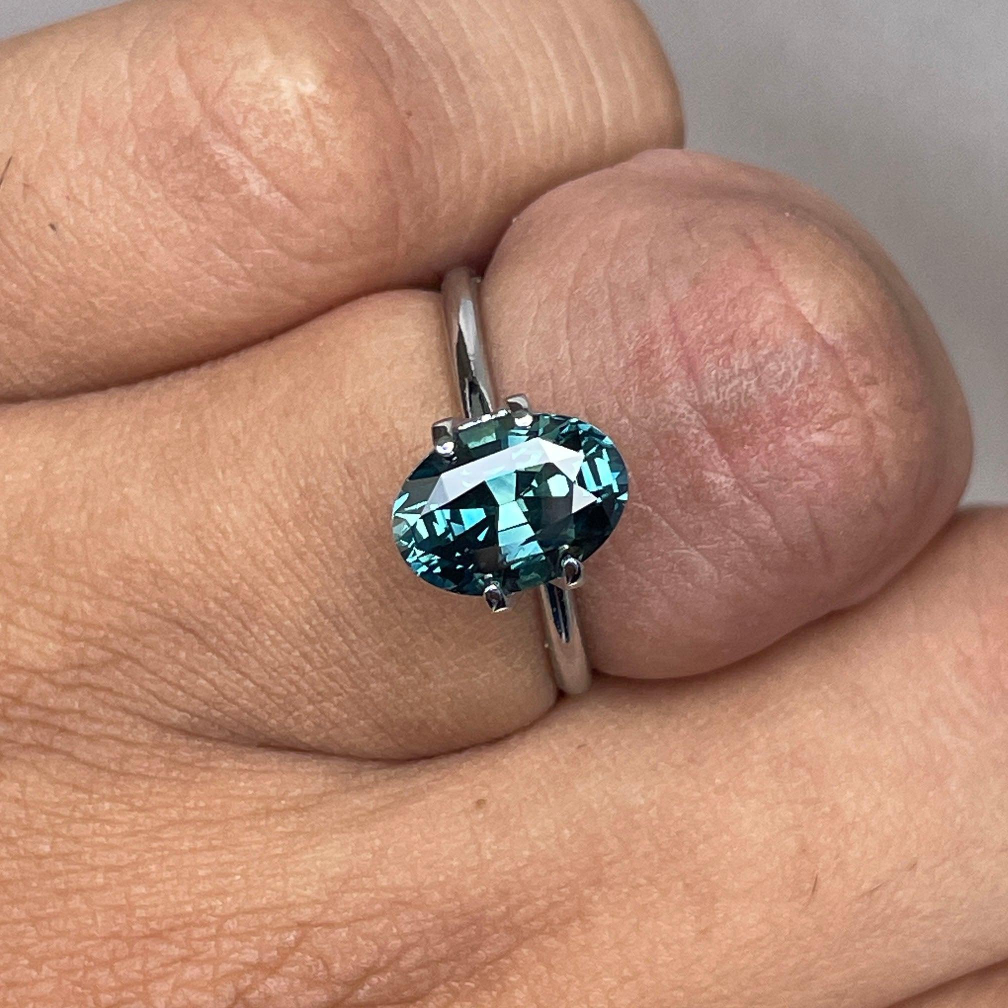 teal blue green parti sapphire oval cut gem 