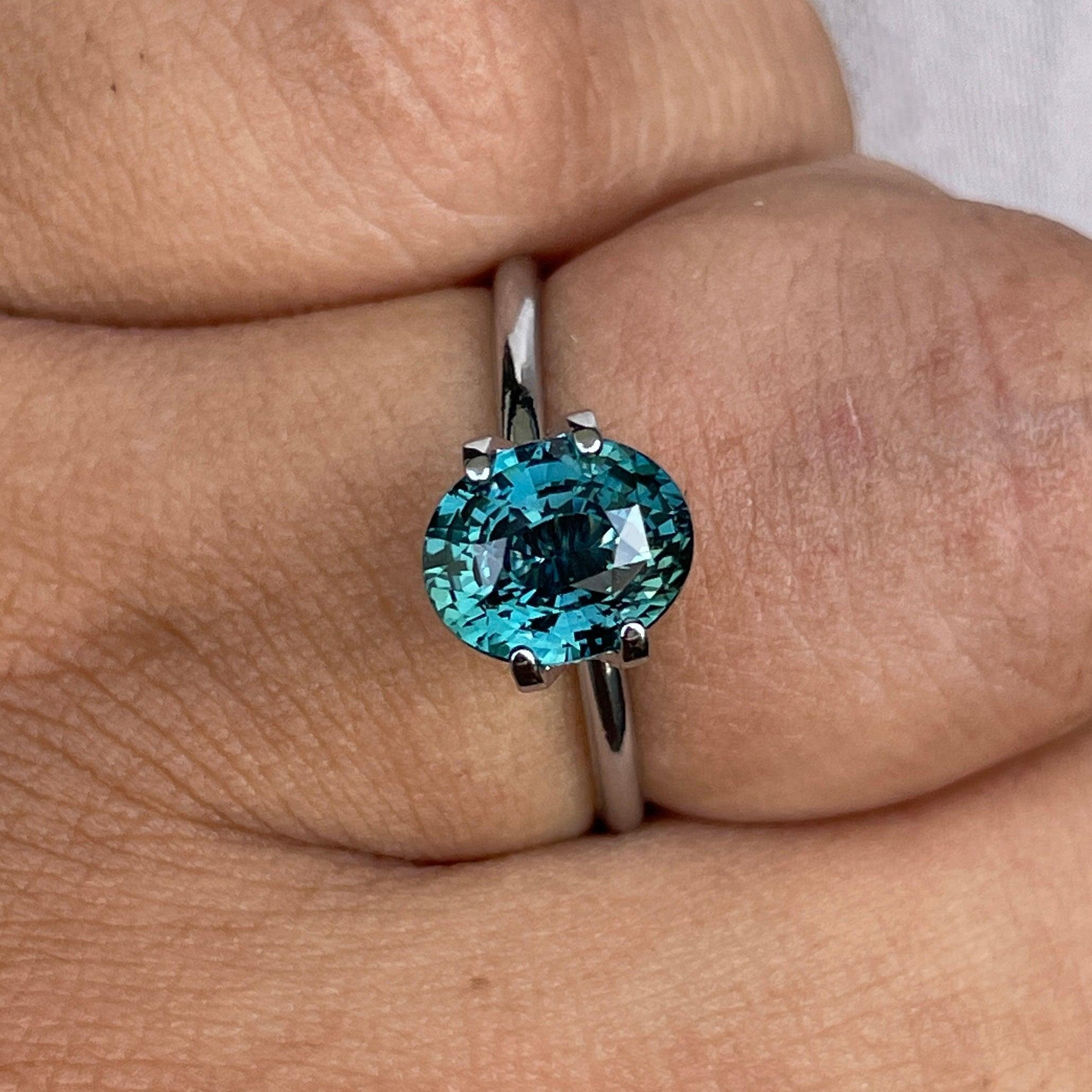 teal blue green parti sapphire oval cut gem 