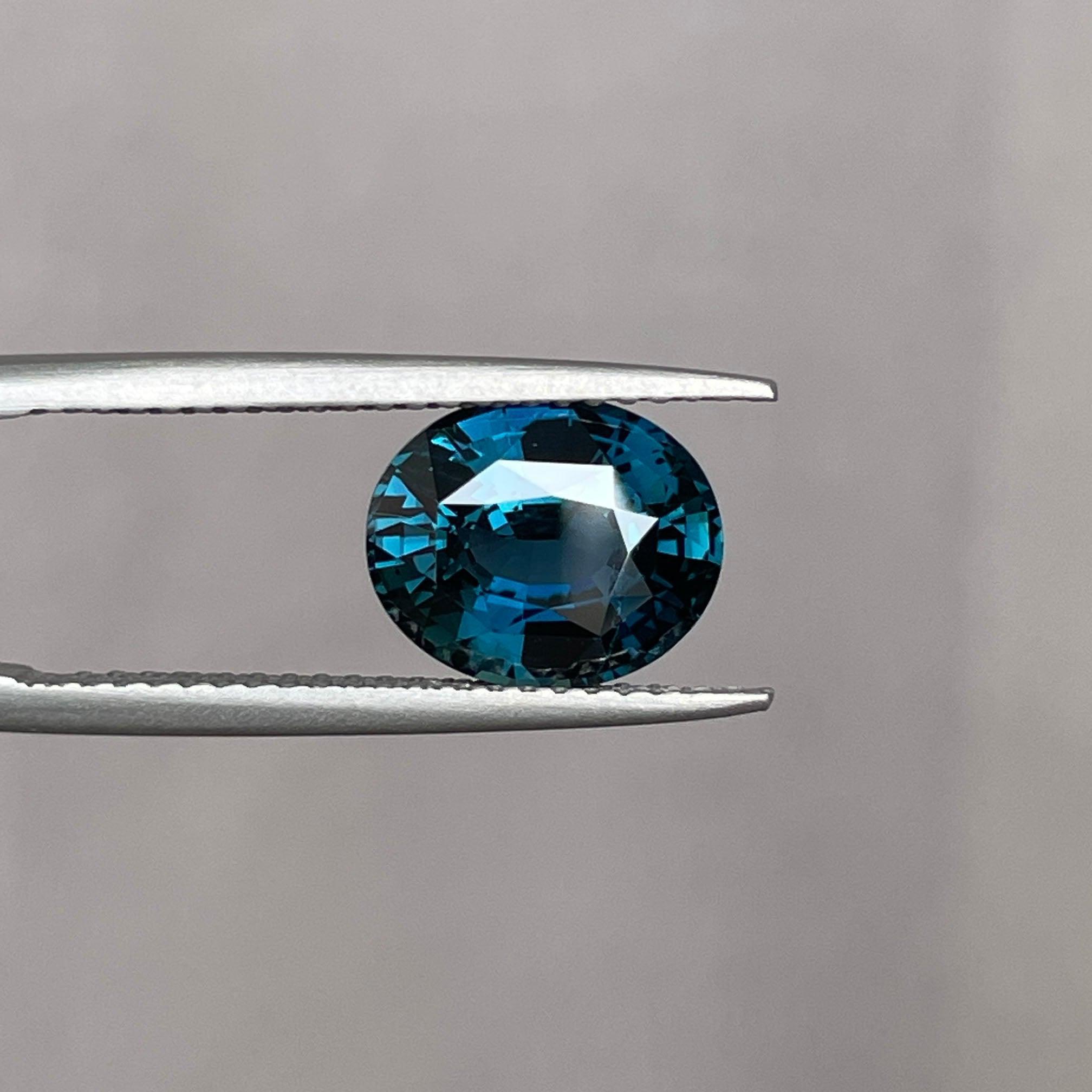 teal blue green parti sapphire oval cut gem 