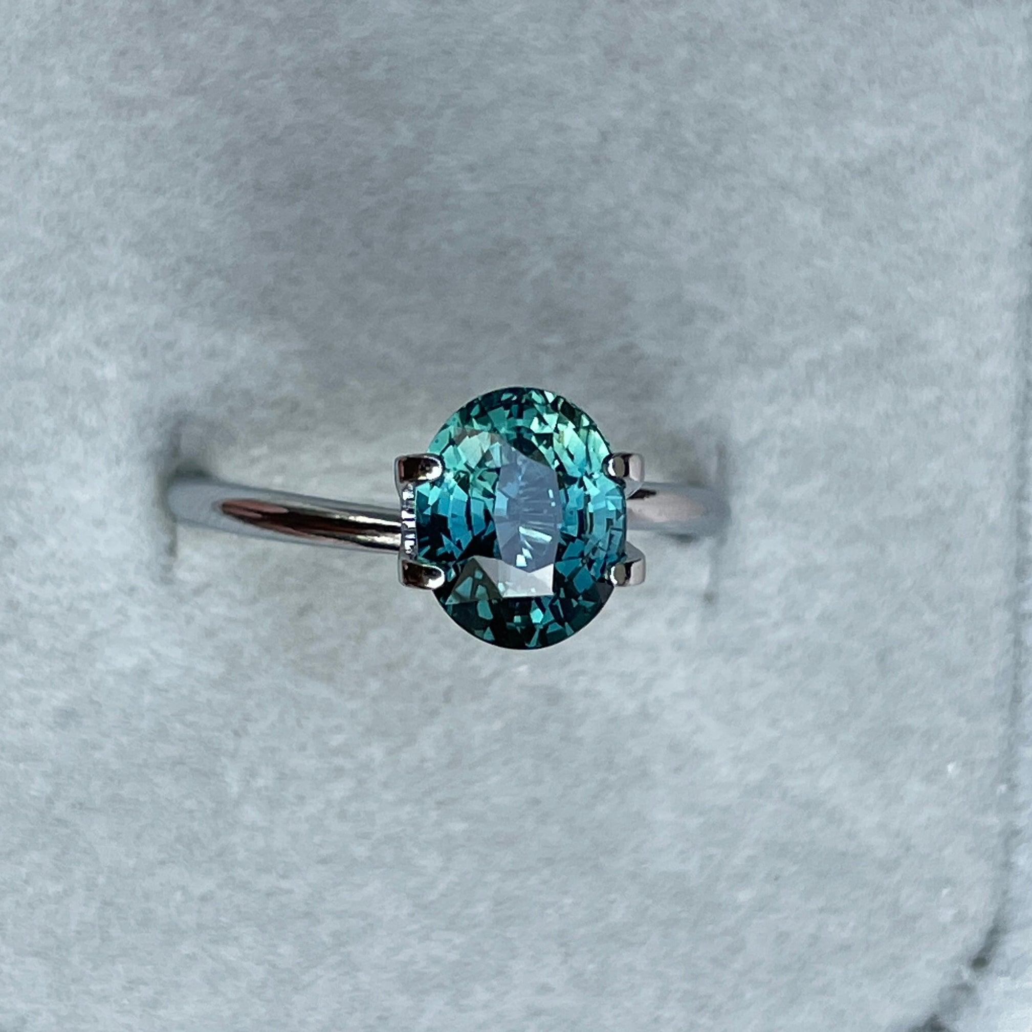 teal blue green parti sapphire oval cut gem 