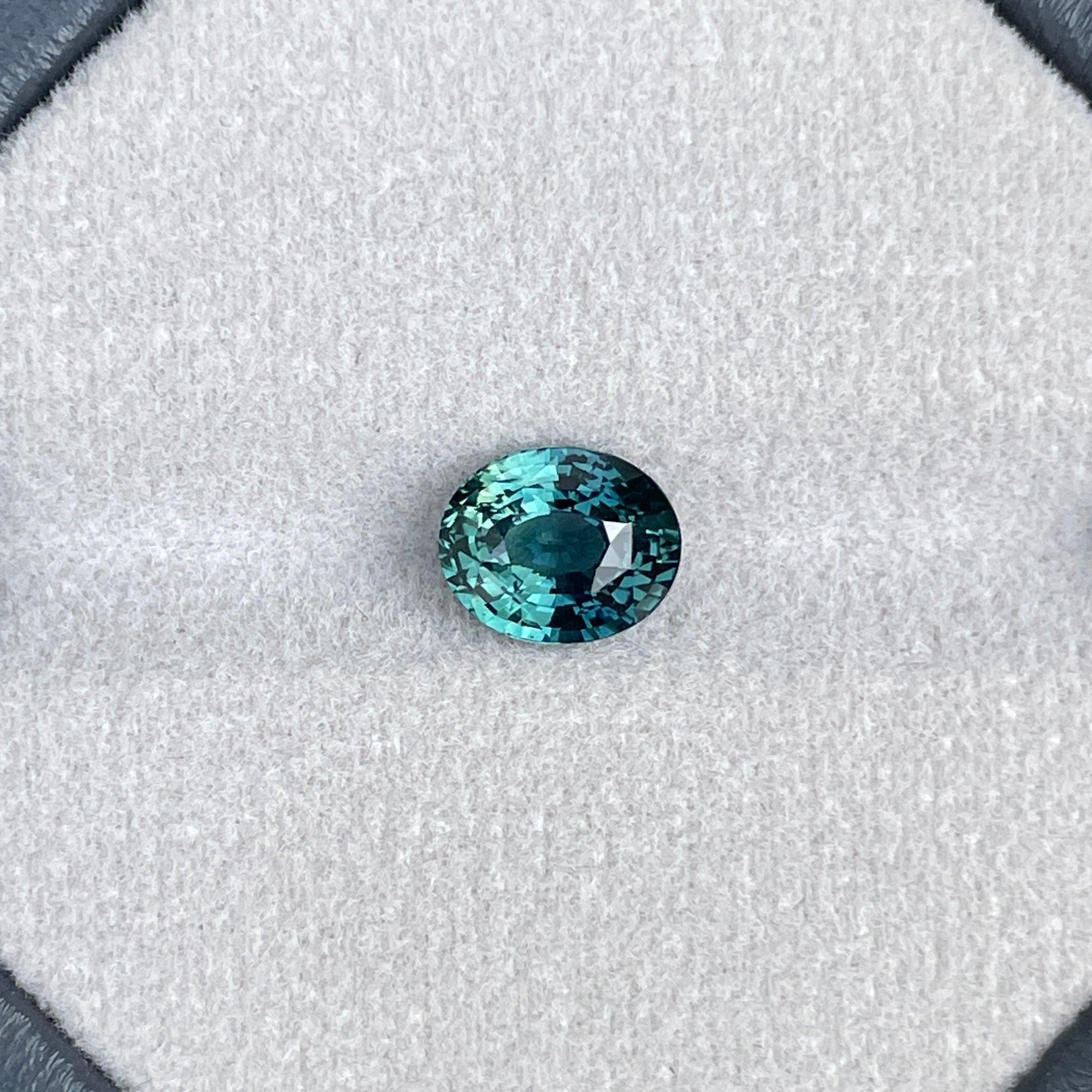teal blue green parti sapphire oval cut gem 