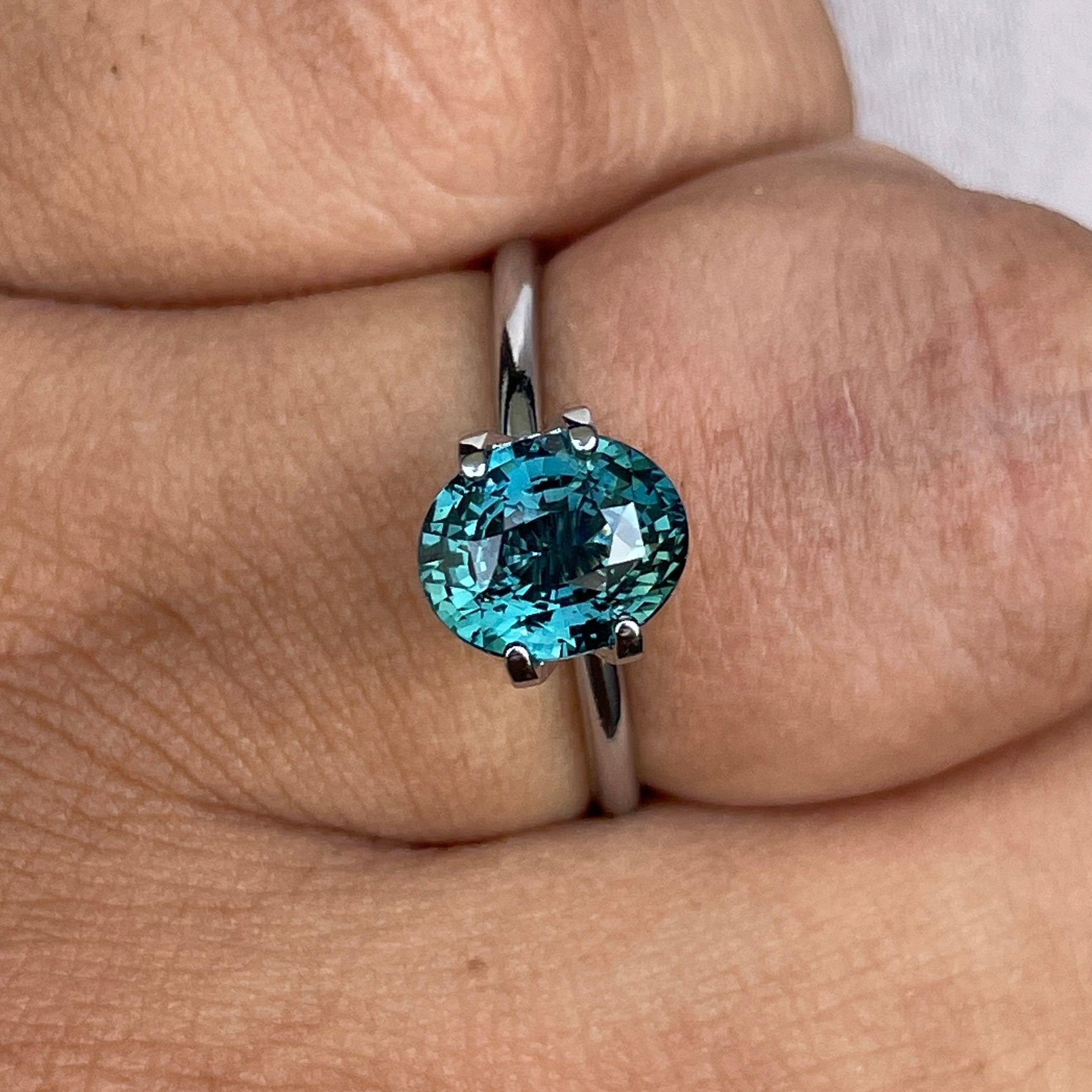 teal blue green parti sapphire oval cut gem 