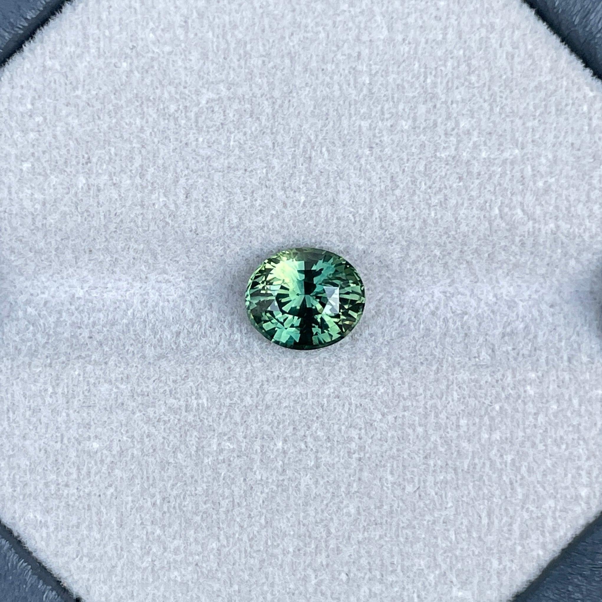 teal blue green parti sapphire oval cut gem 
