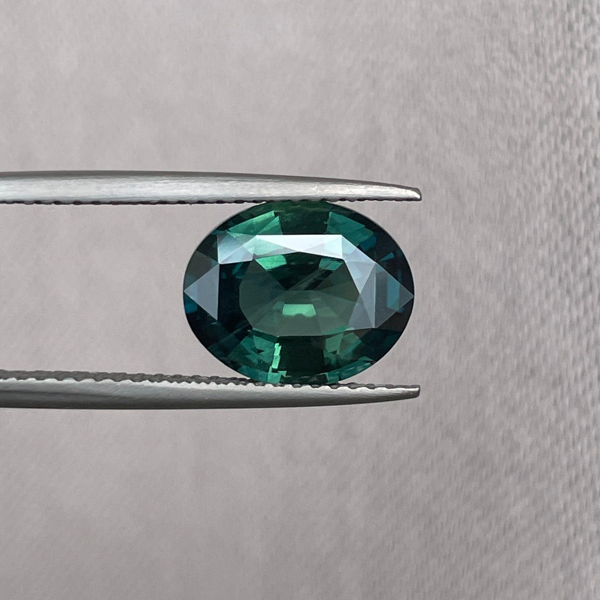 teal blue green parti sapphire oval cut gem 