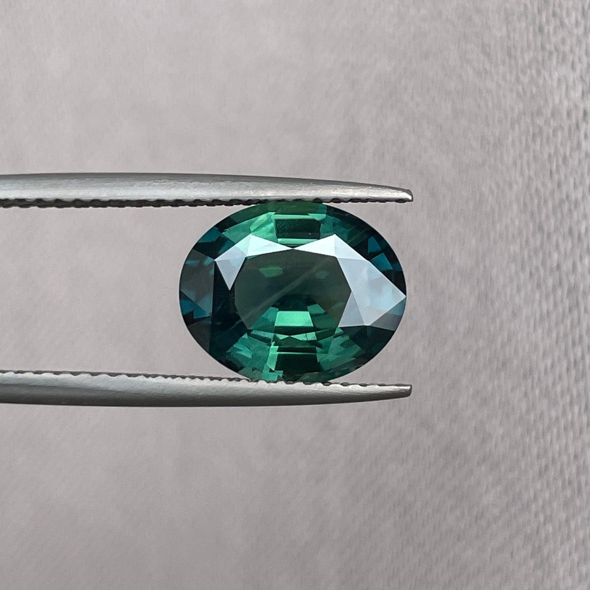 teal blue green parti sapphire oval cut gem 