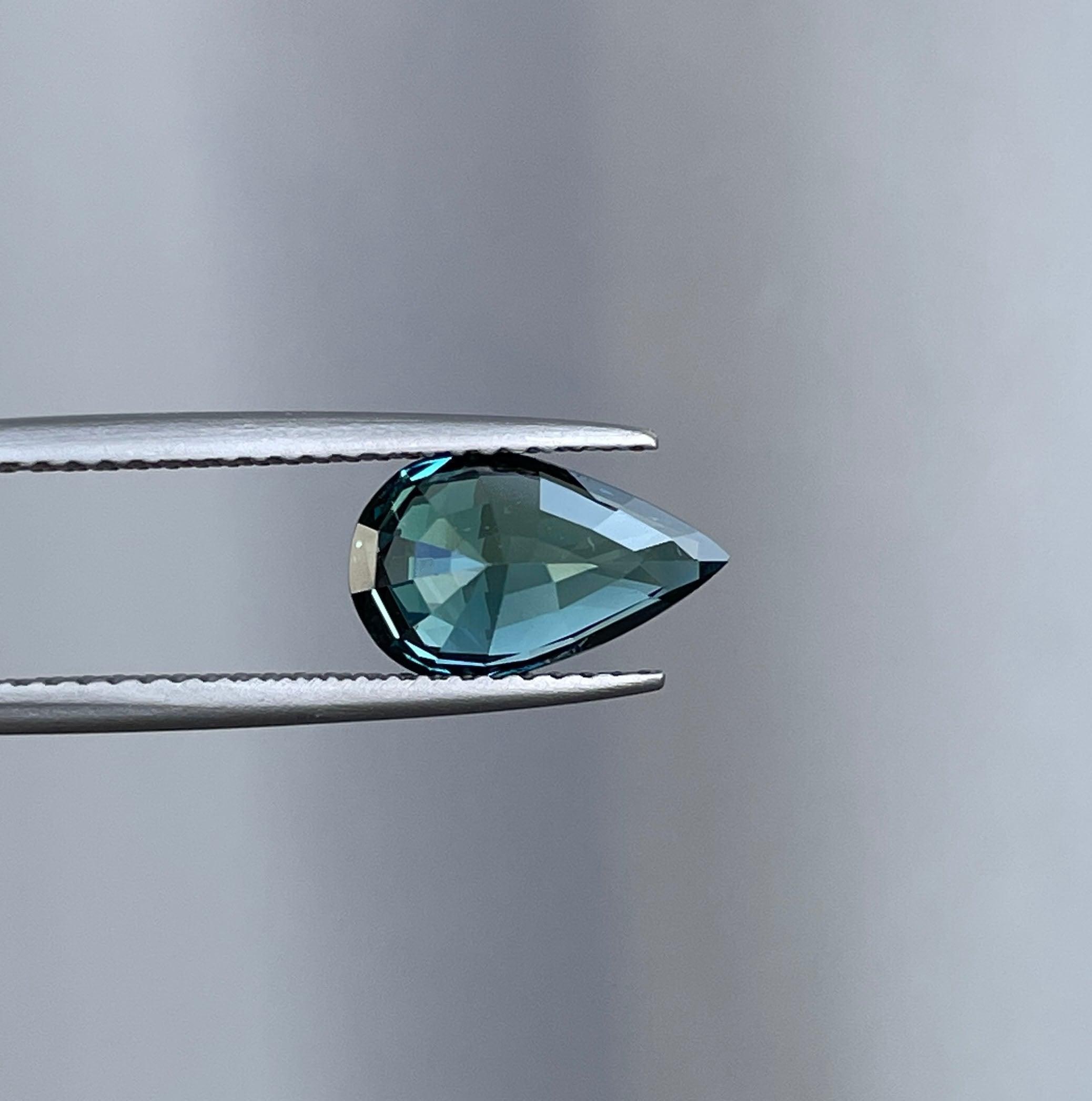 teal blue green parti sapphire pear drop cut gem 