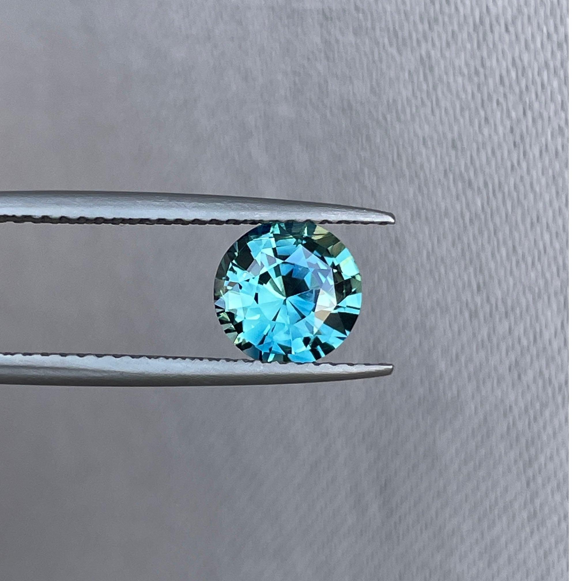teal blue green parti sapphire round cut gem 