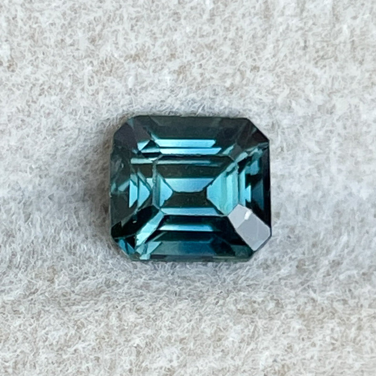 Natural teal blue sapphire loose gemstone, 1.06 Ct emerald cut, NASHGEMS, ideal for engagement rings or custom jewelry.