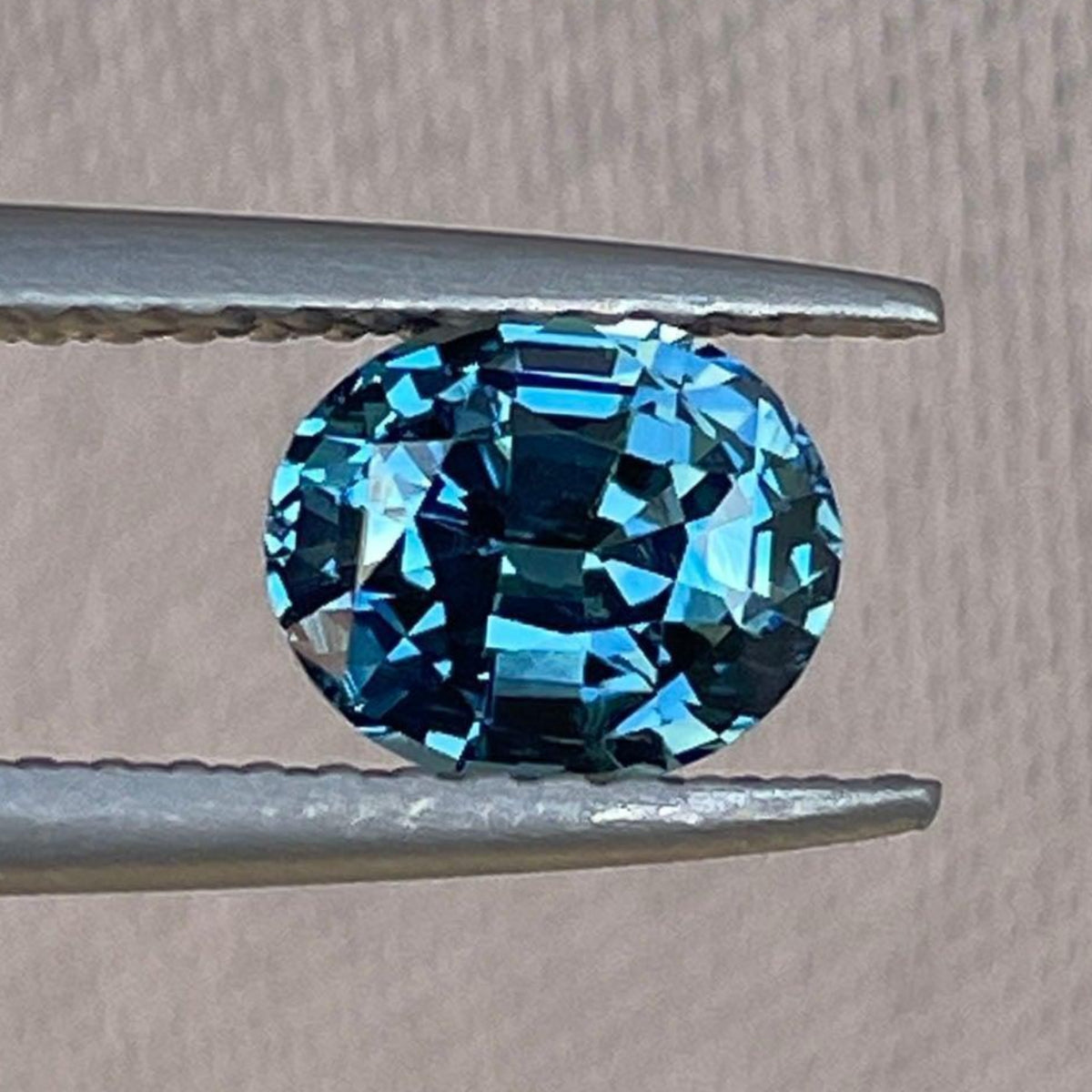 Blue and green oval cut sapphire gemstone, 1.20 carats, loose teal sapphire by NASHGEMS for jewelry making and custom designs.