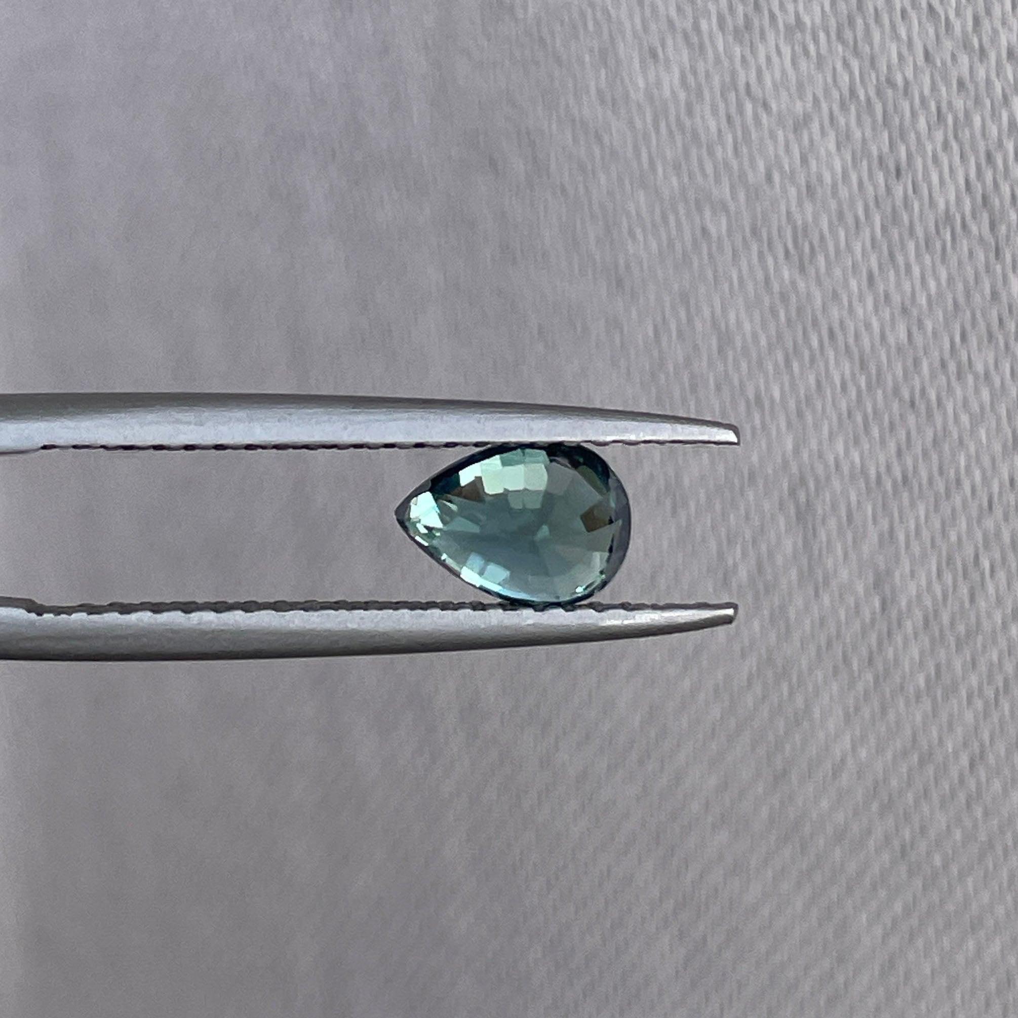 teal sapphire engagement ring