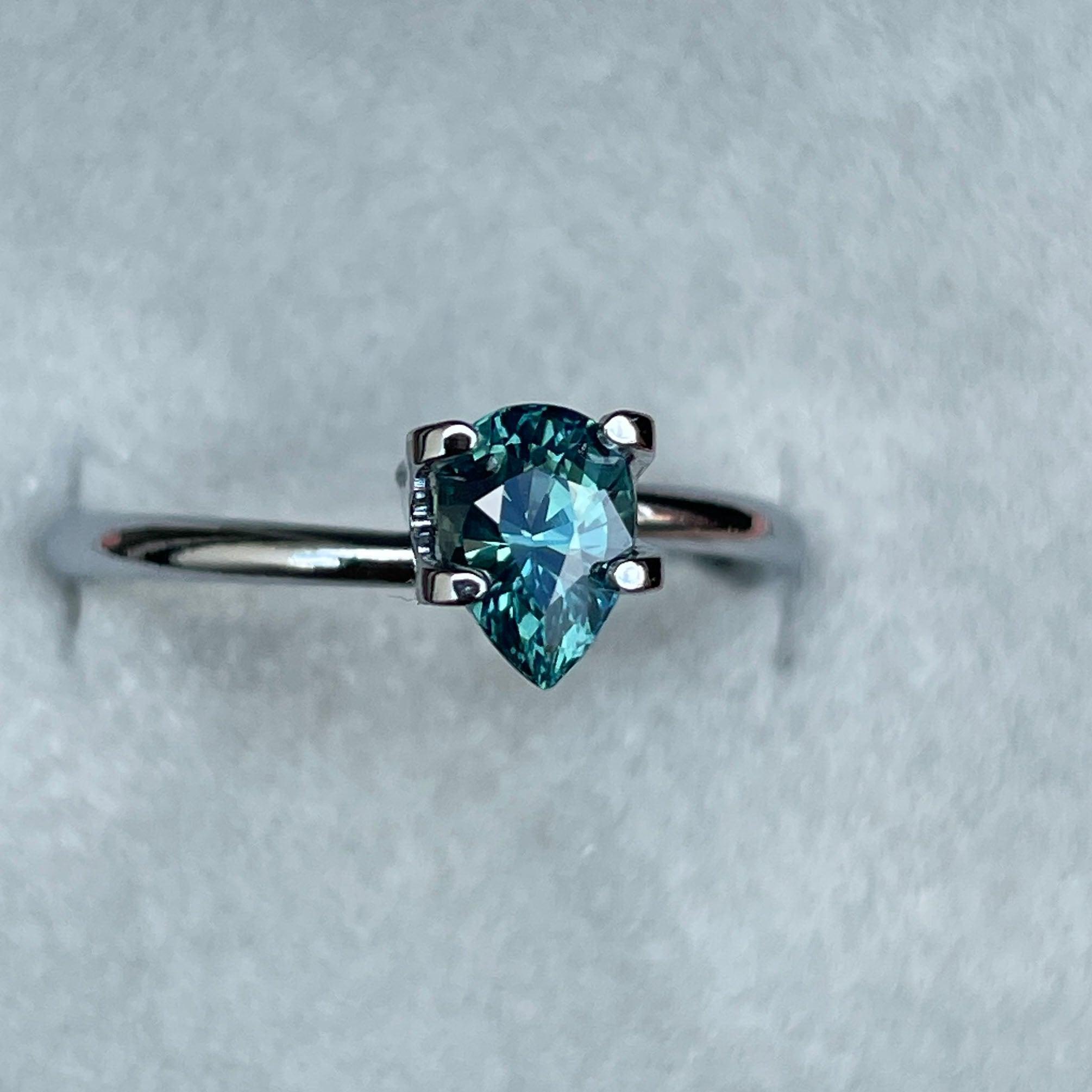 teal sapphire engagement ring