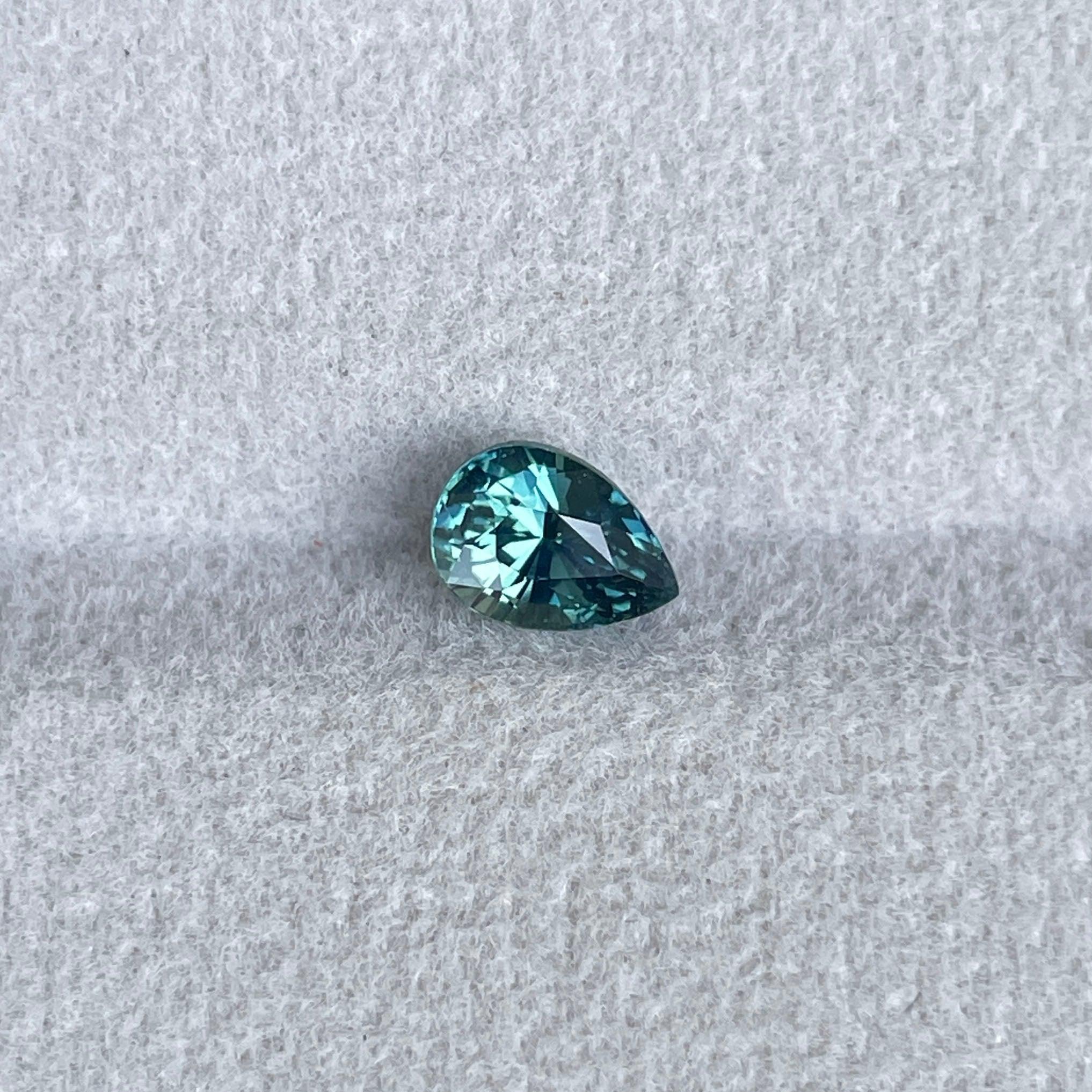 teal sapphire engagement ring
