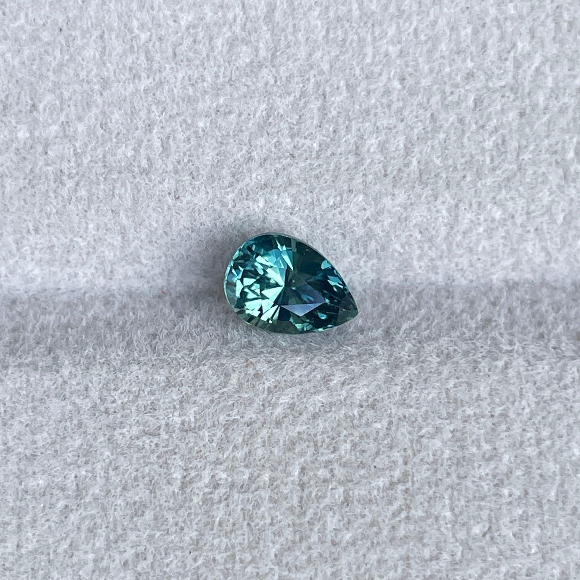 teal sapphire engagement ring