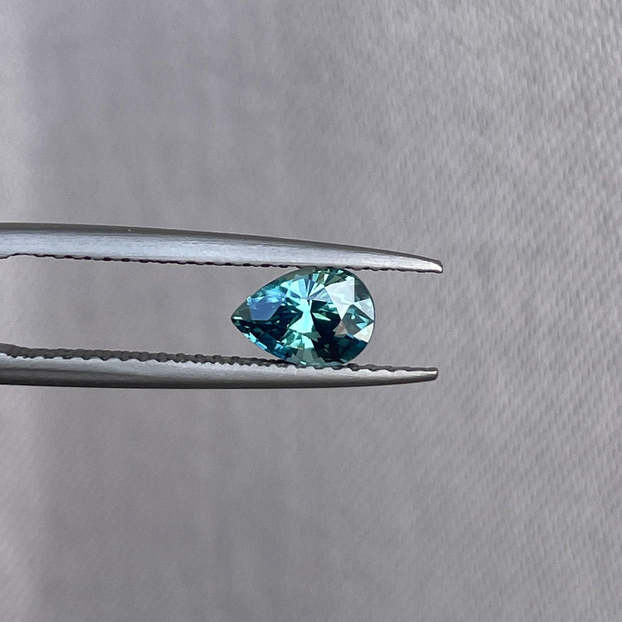 teal sapphire engagement ring