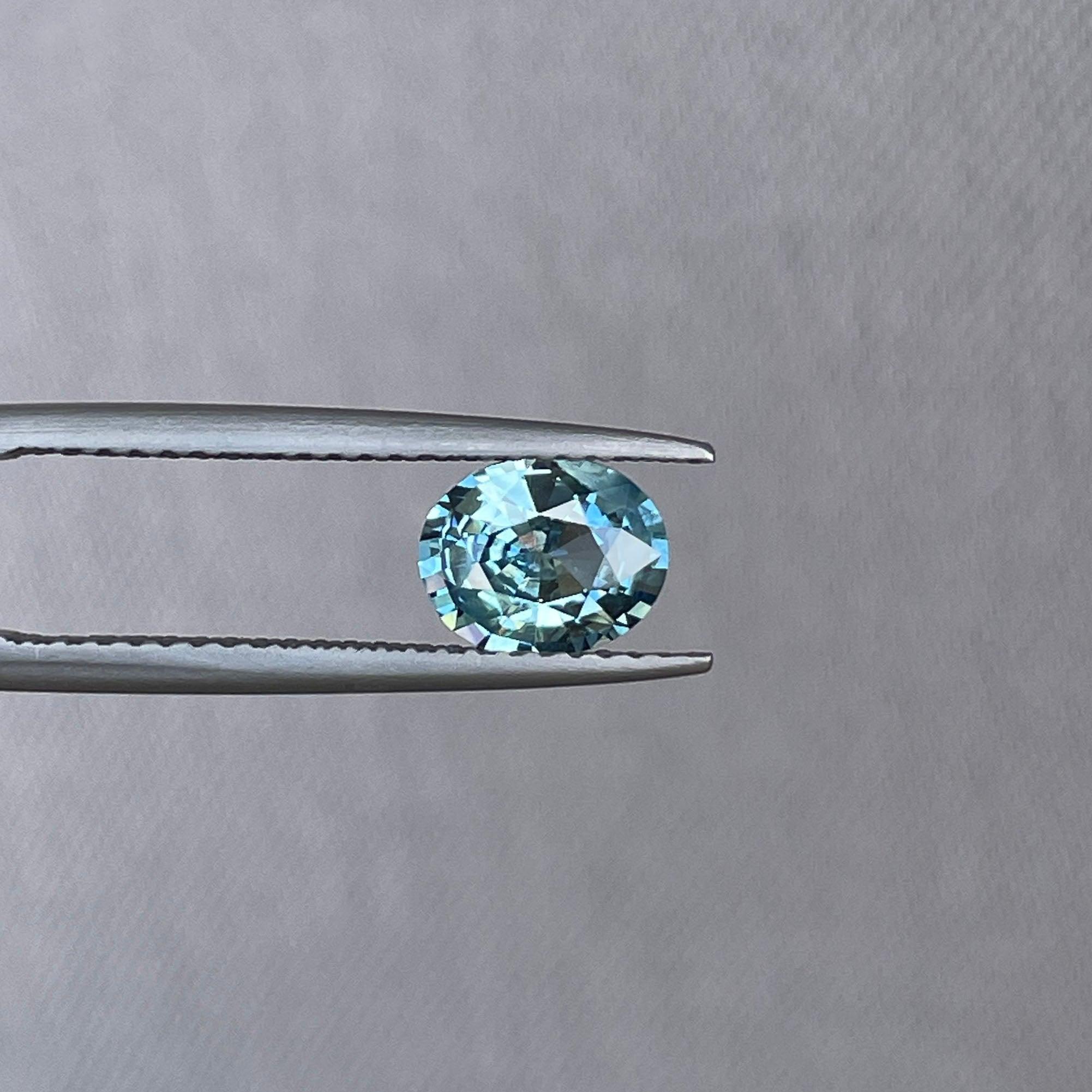 teal sapphire engagement ring