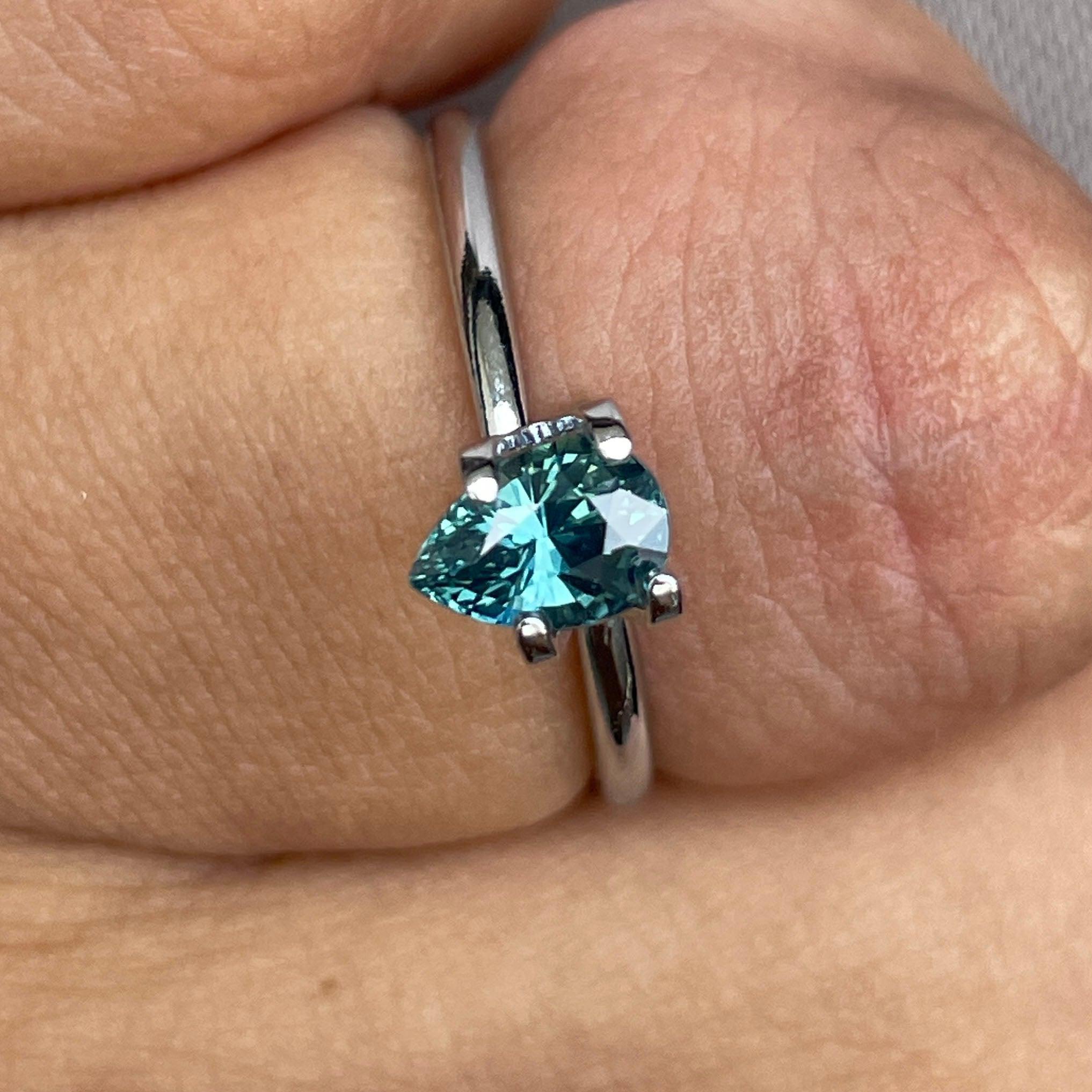 teal sapphire engagement ring