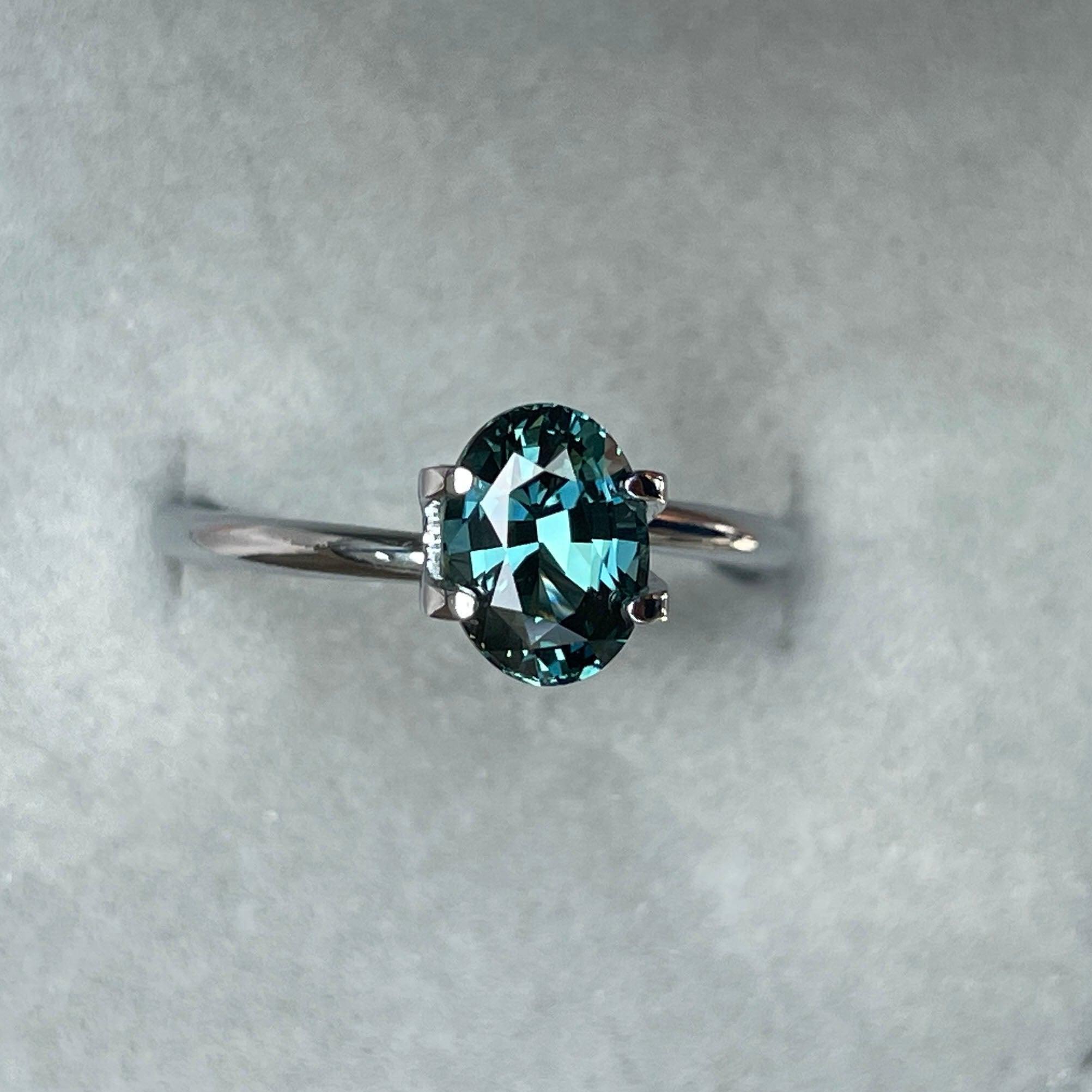 teal sapphire engagement rings