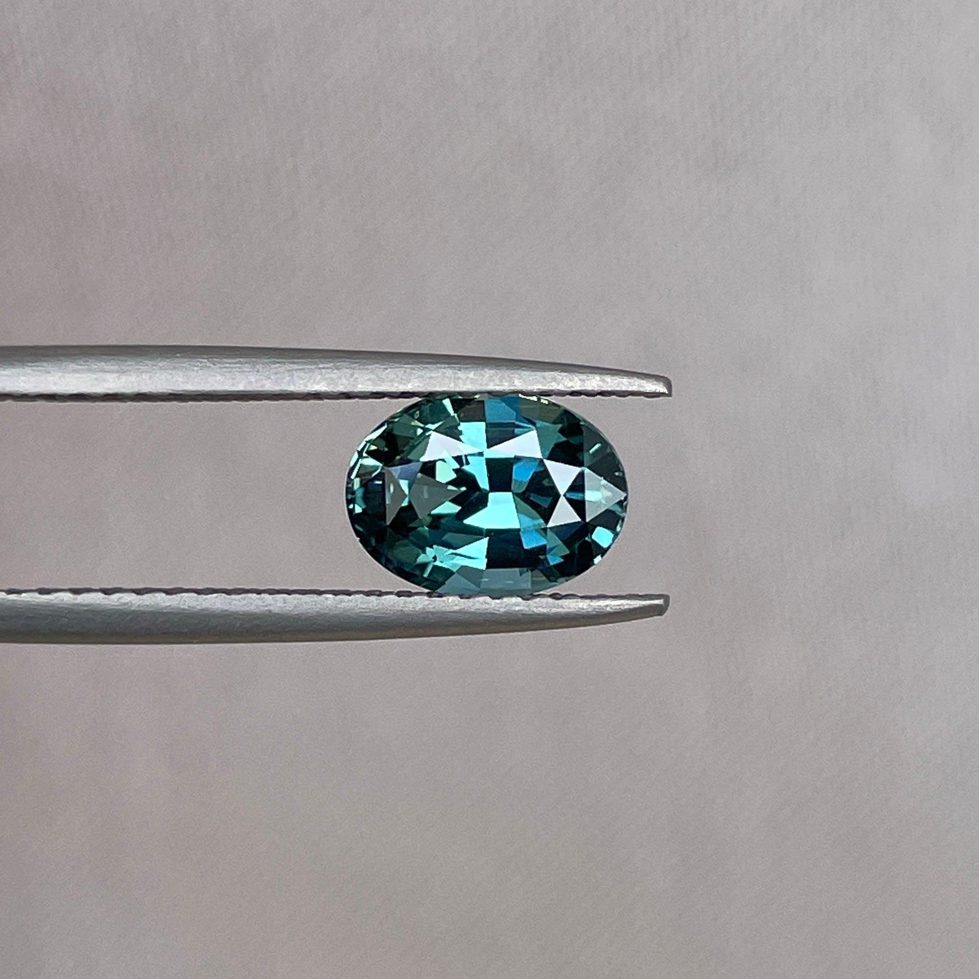 teal sapphire engagement rings