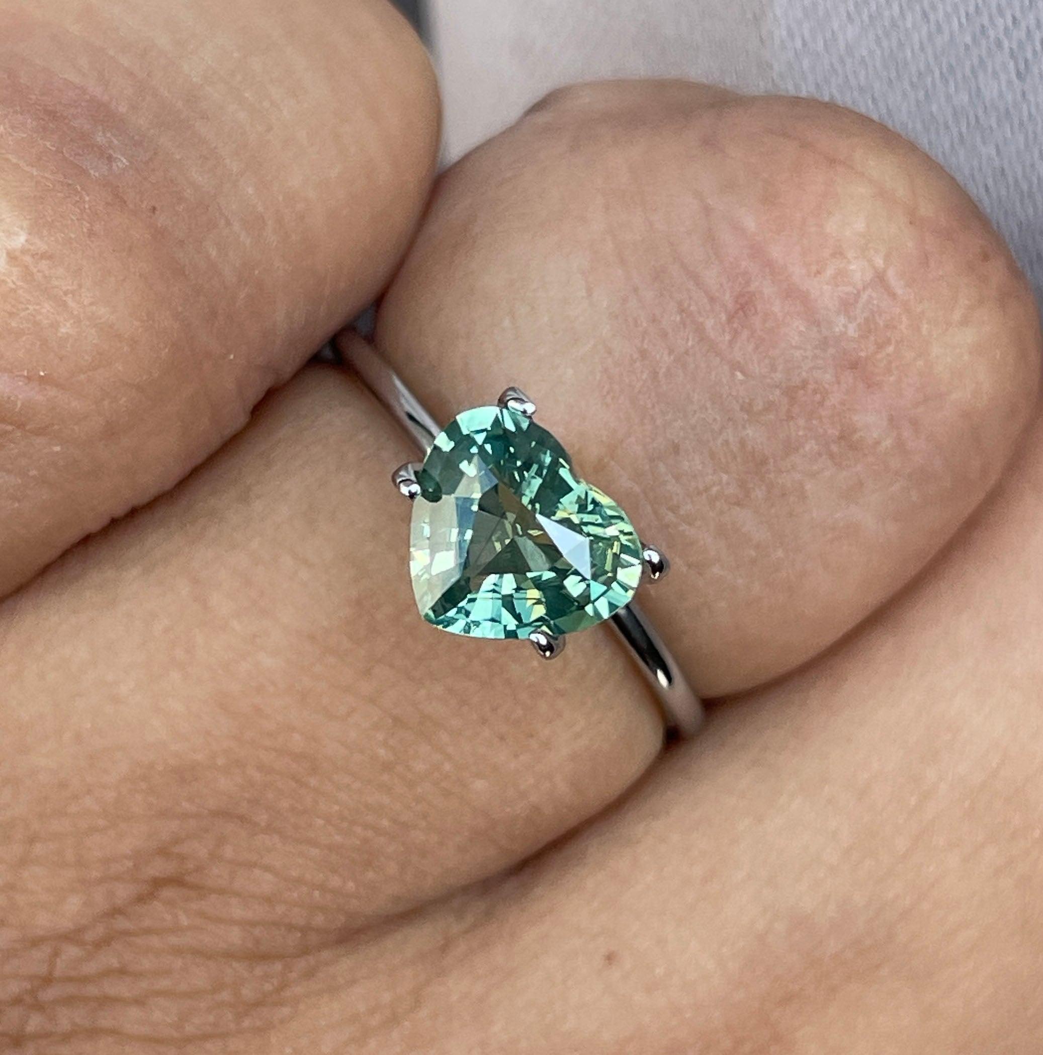 teal sapphire engagement rings