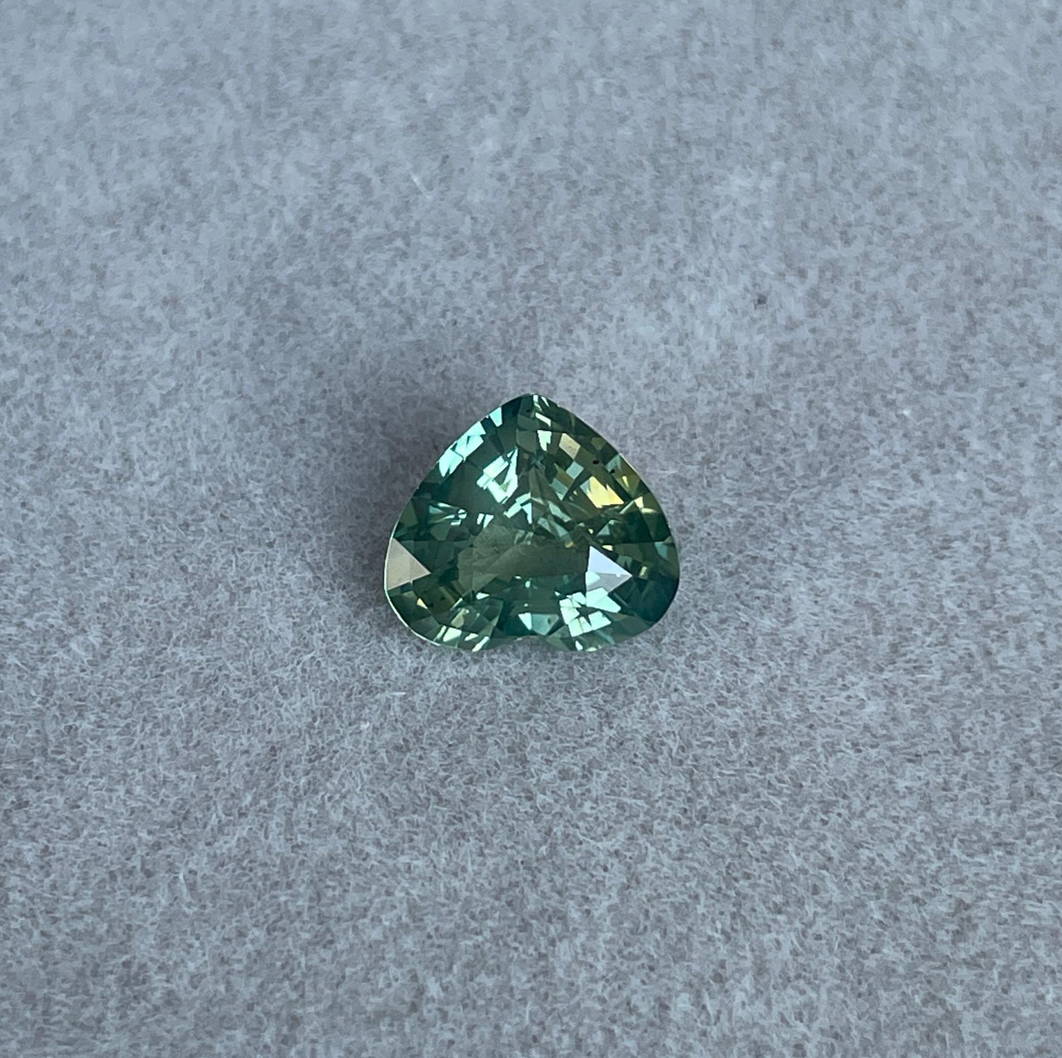 teal sapphire engagement rings
