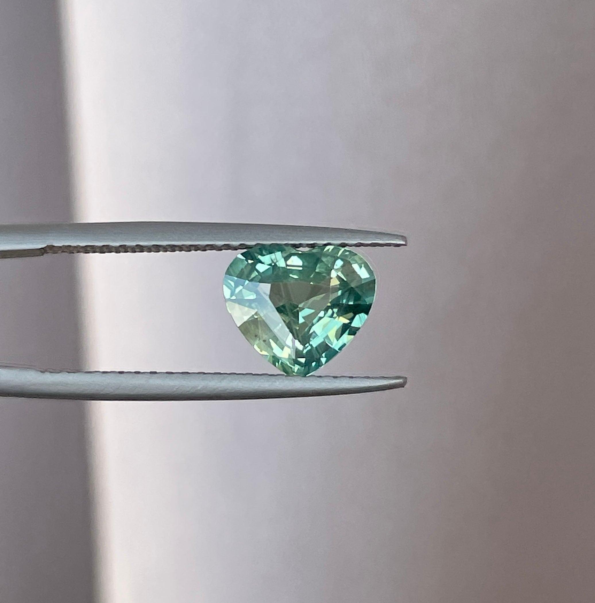 teal sapphire engagement rings