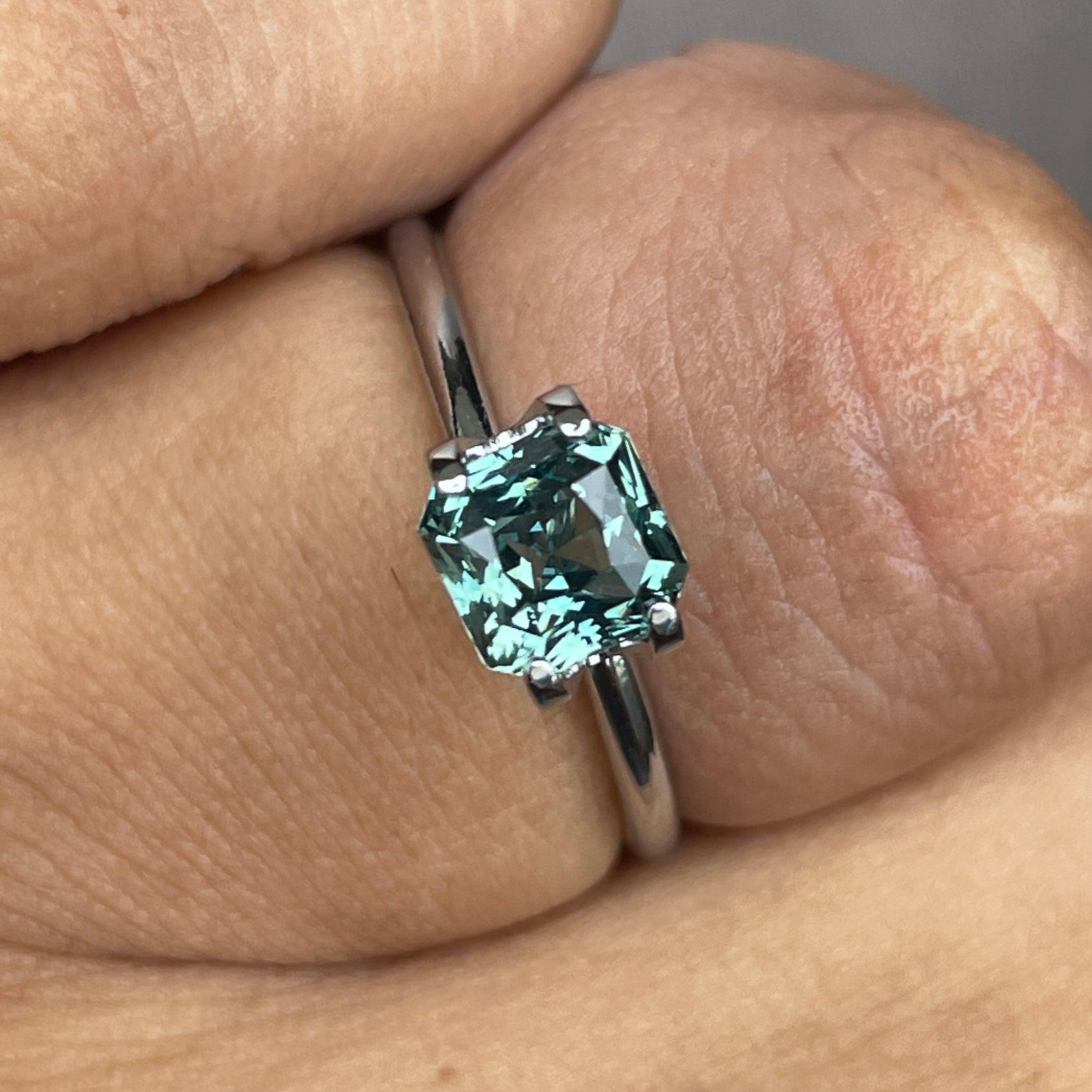 teal sapphire engagement rings