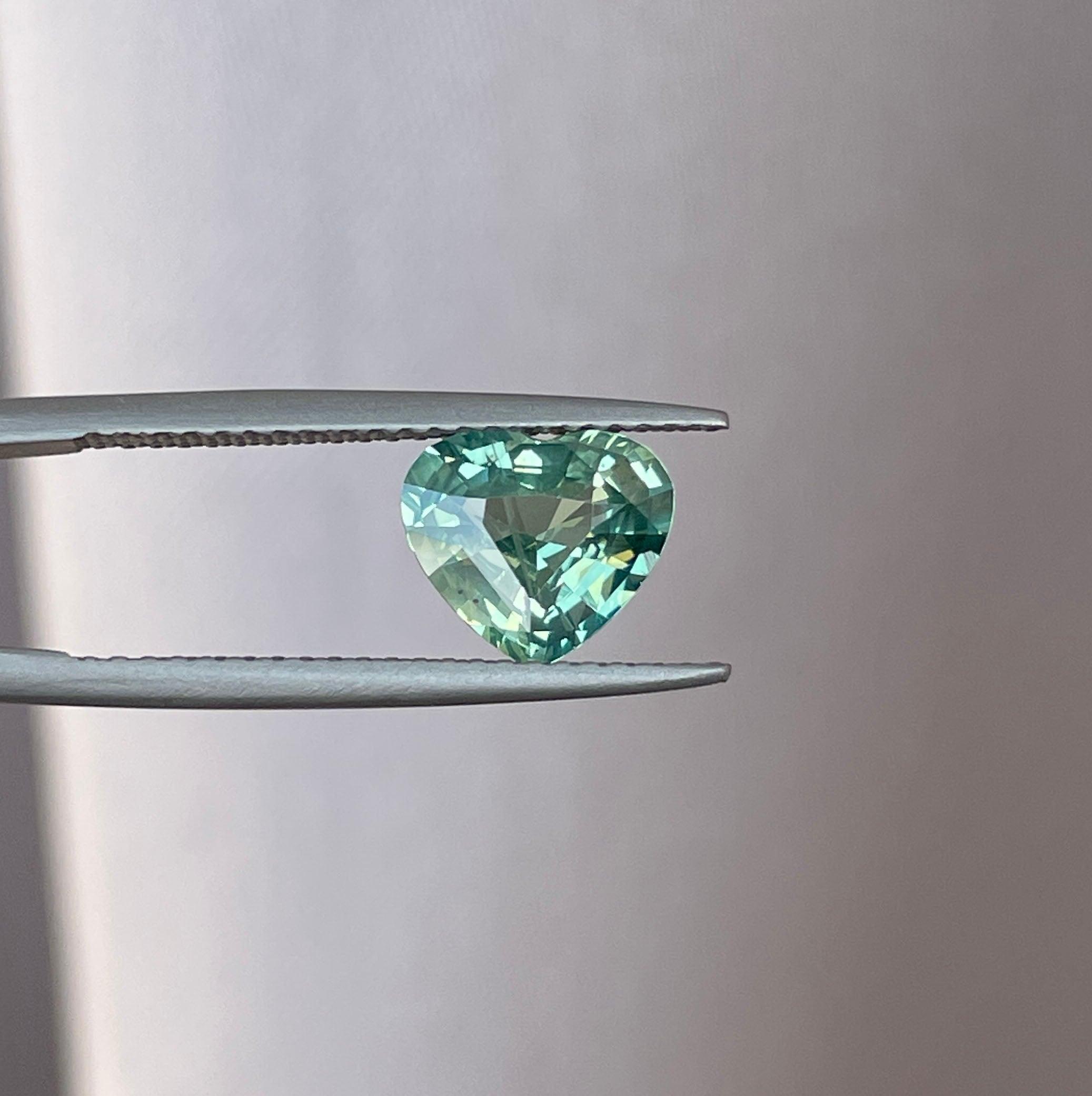 teal sapphire engagement rings