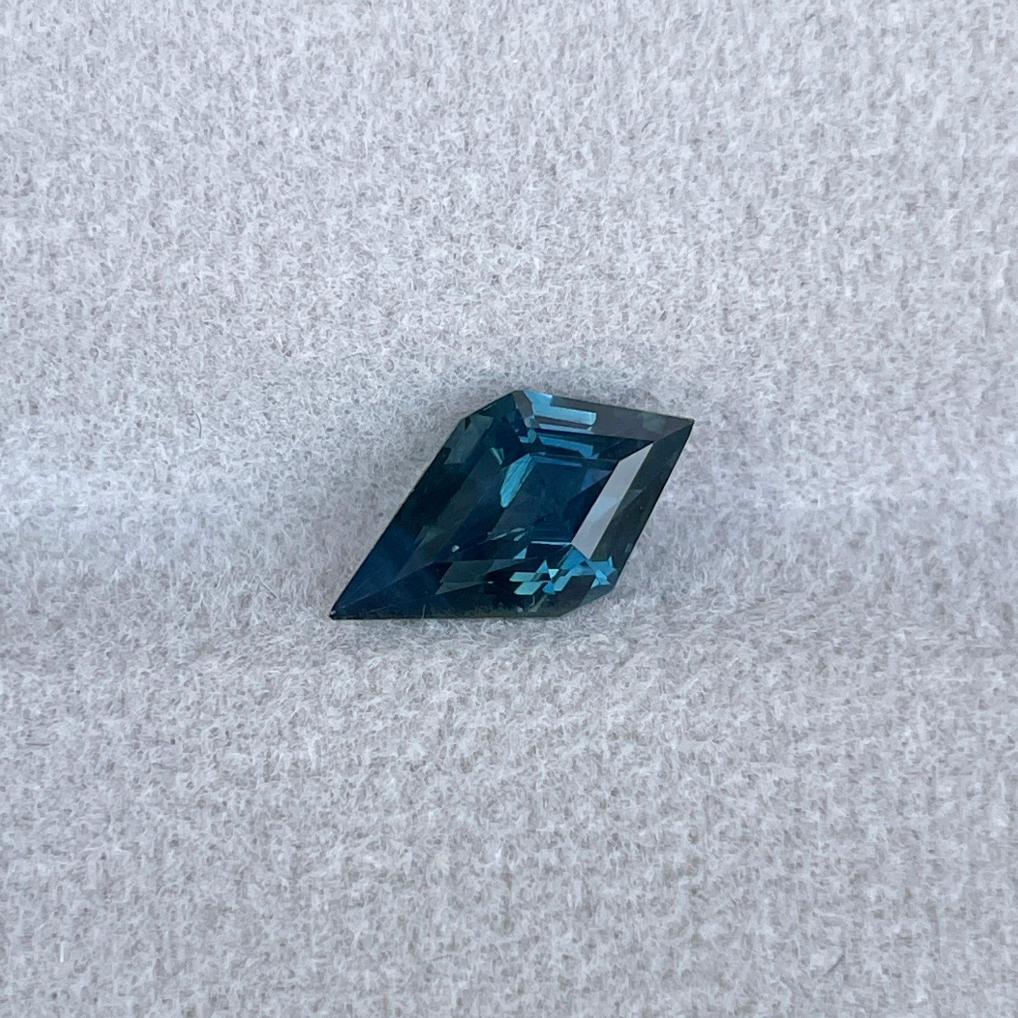 teal sapphire engagement rings