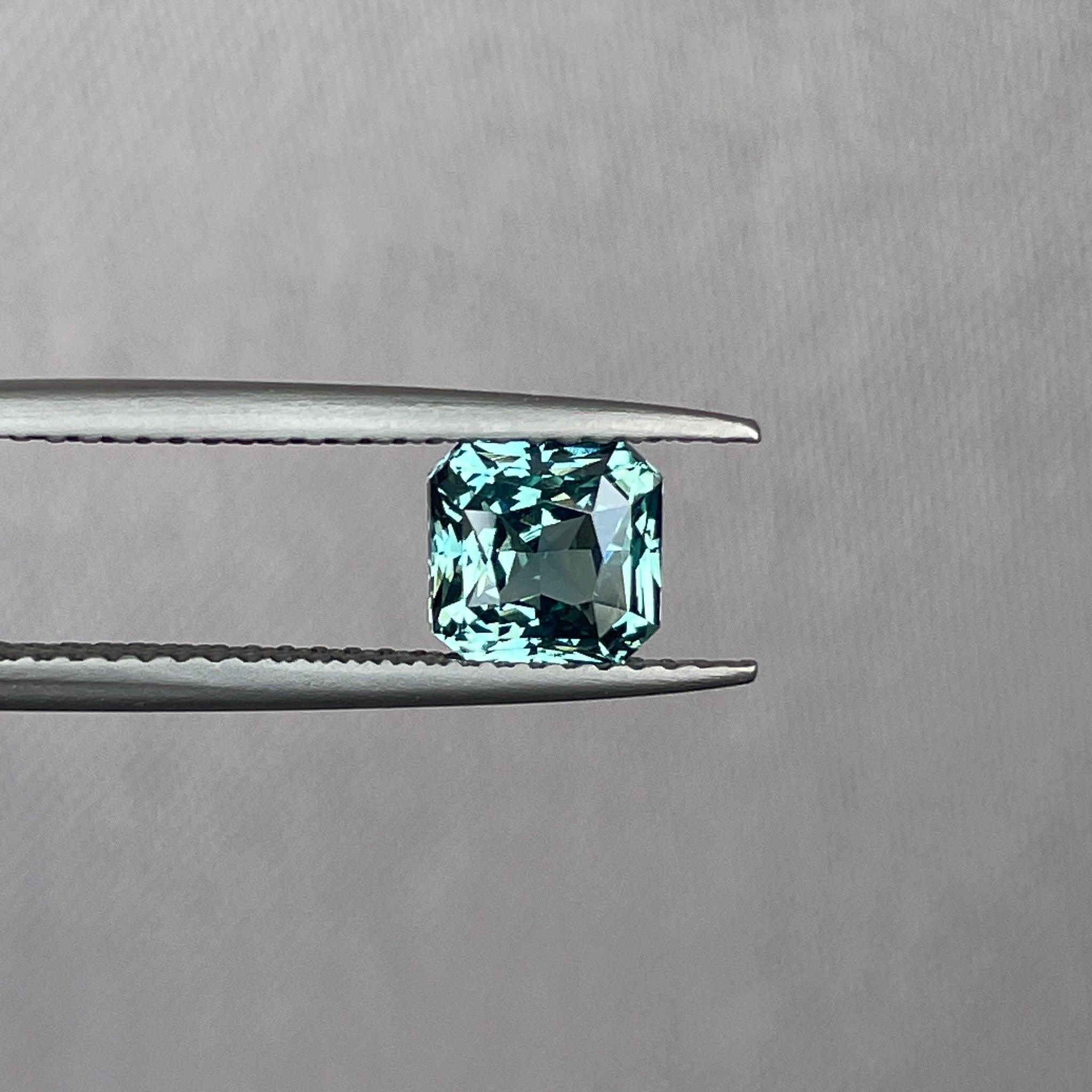 teal sapphire engagement rings