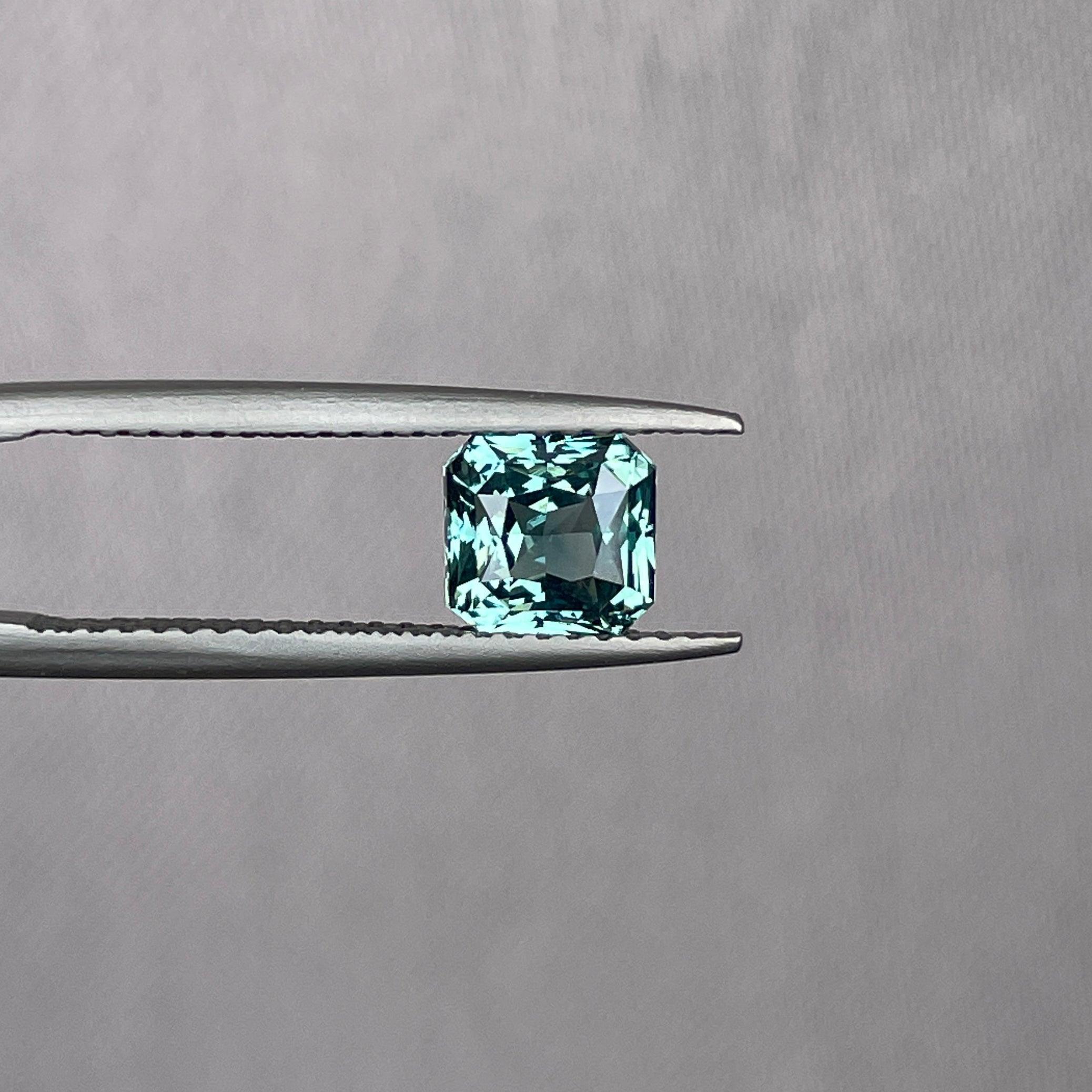 teal sapphire engagement rings