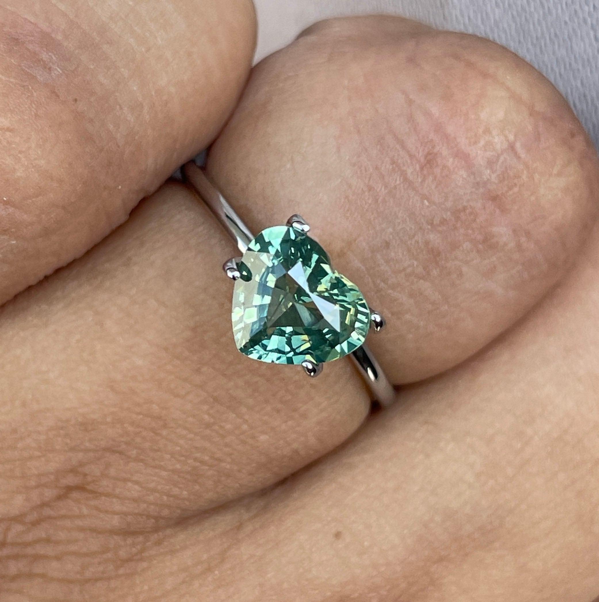 teal sapphire engagement rings