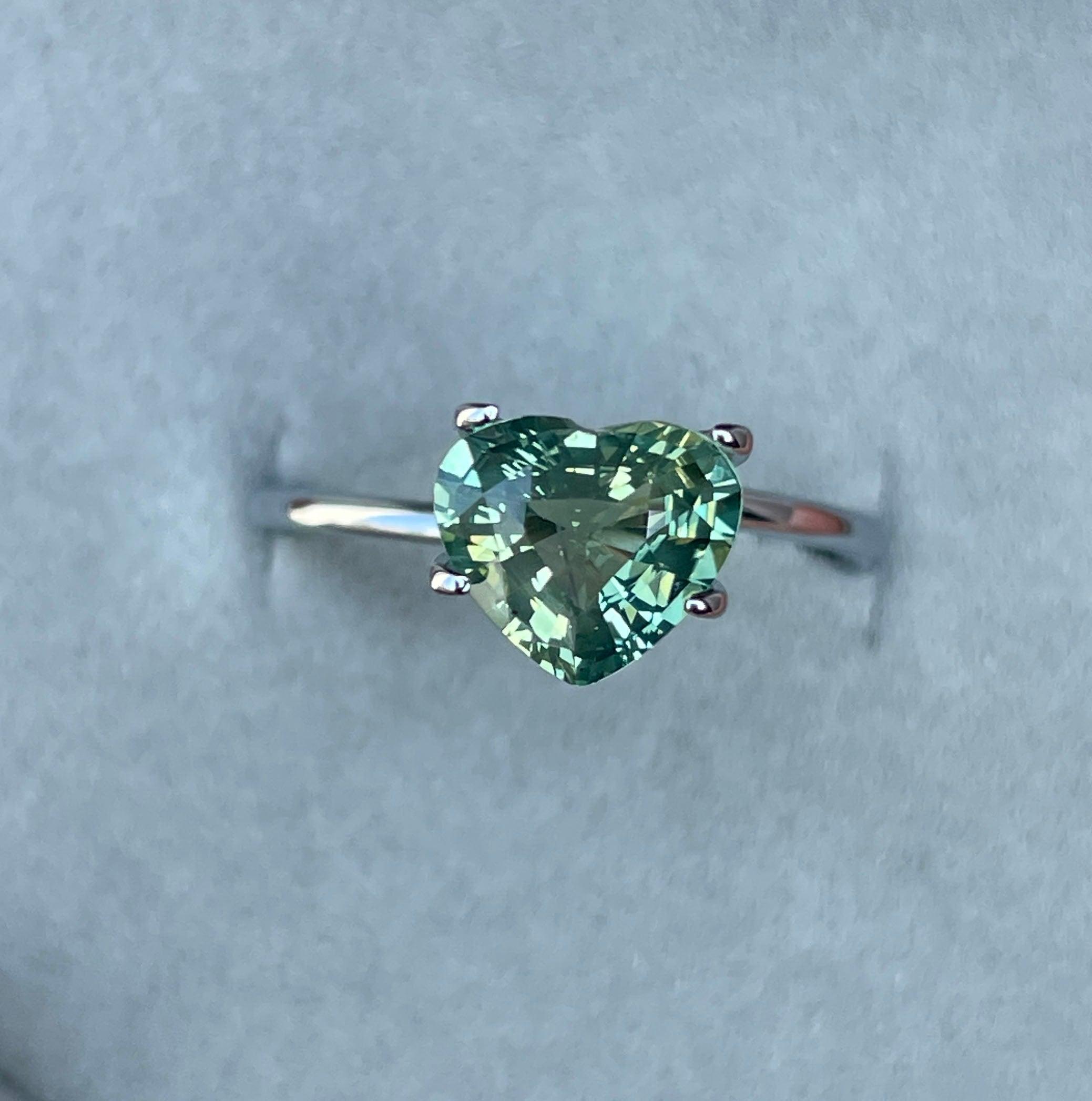 teal sapphire engagement rings