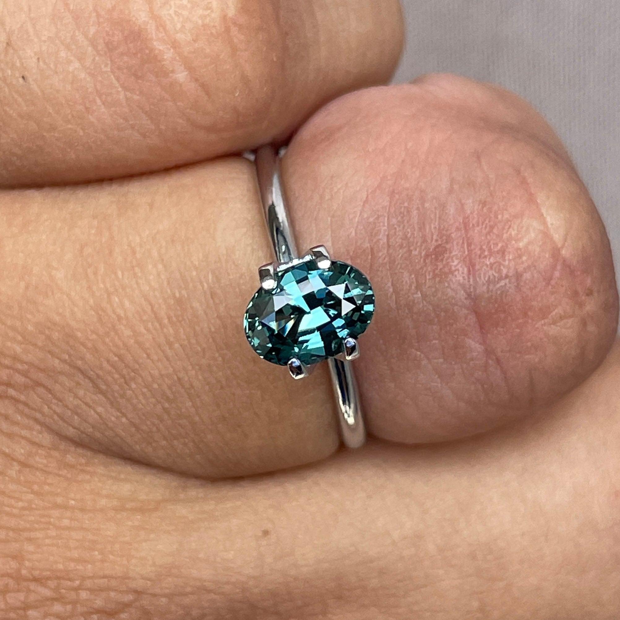 teal sapphire engagement rings