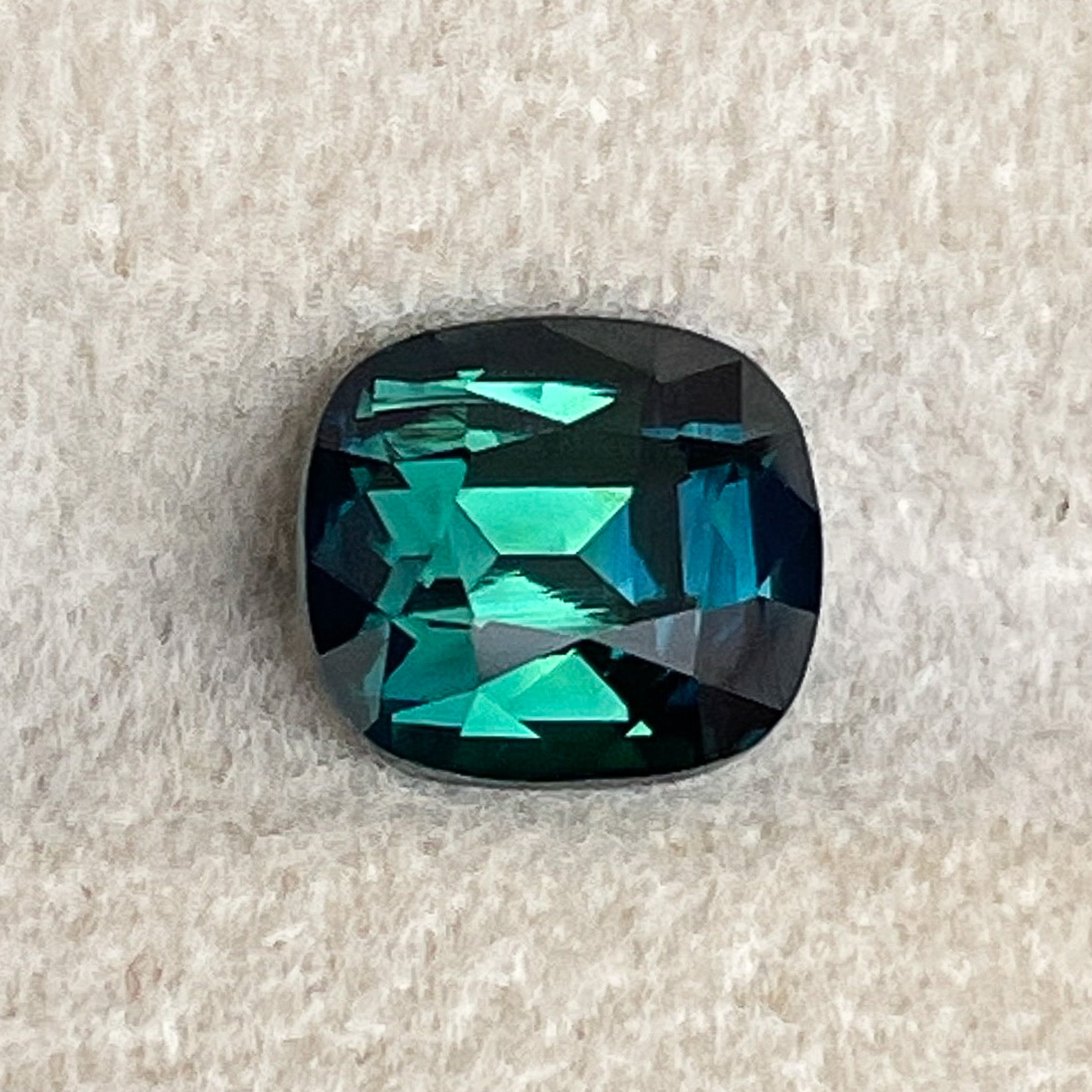 Natural forest green sapphire, 2.56 Ct cushion cut teal sapphire from NASHGEMS, loose gemstone for engagement or custom jewelry.