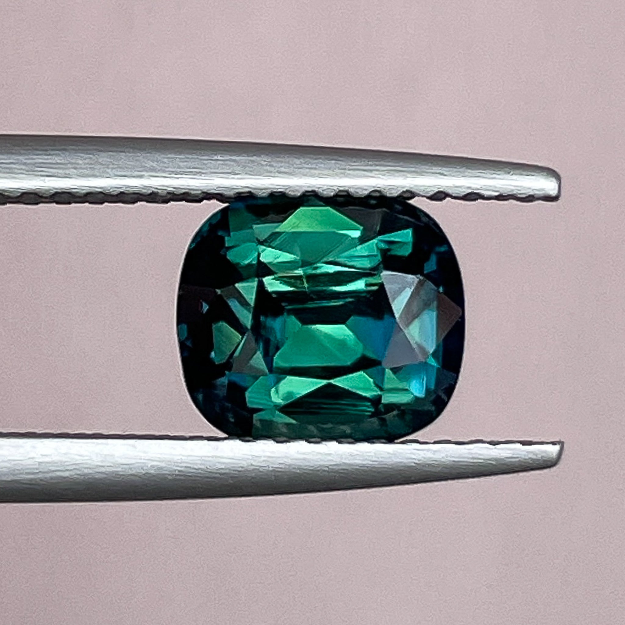 Natural forest green sapphire, 2.56 Ct cushion cut loose teal gemstone from NASHGEMS, ideal for engagement rings or custom jewelry.