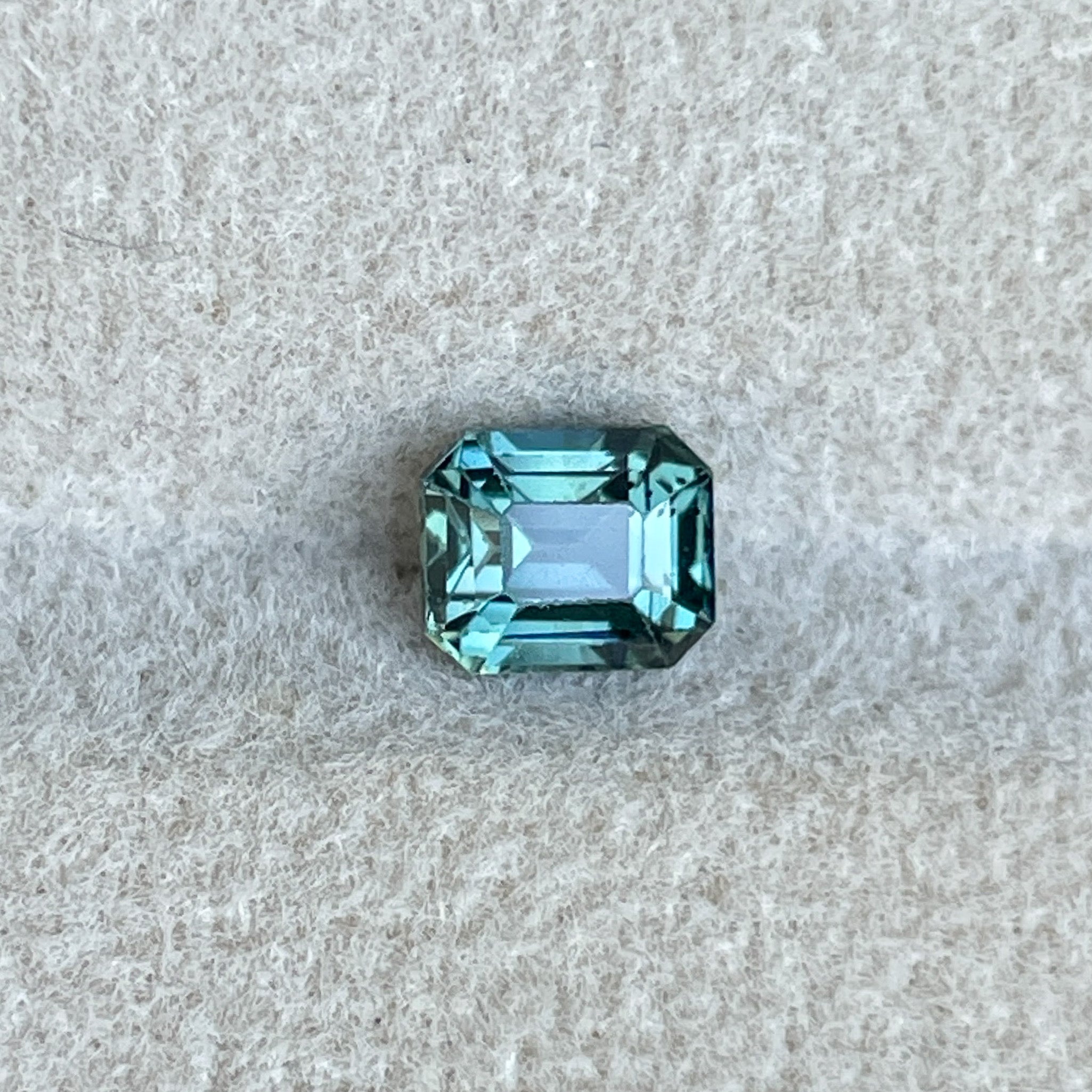 Natural Teal Sapphire 1.05 Ct emerald cut loose gemstone from NASHGEMS, ideal for engagement rings or custom jewelry.