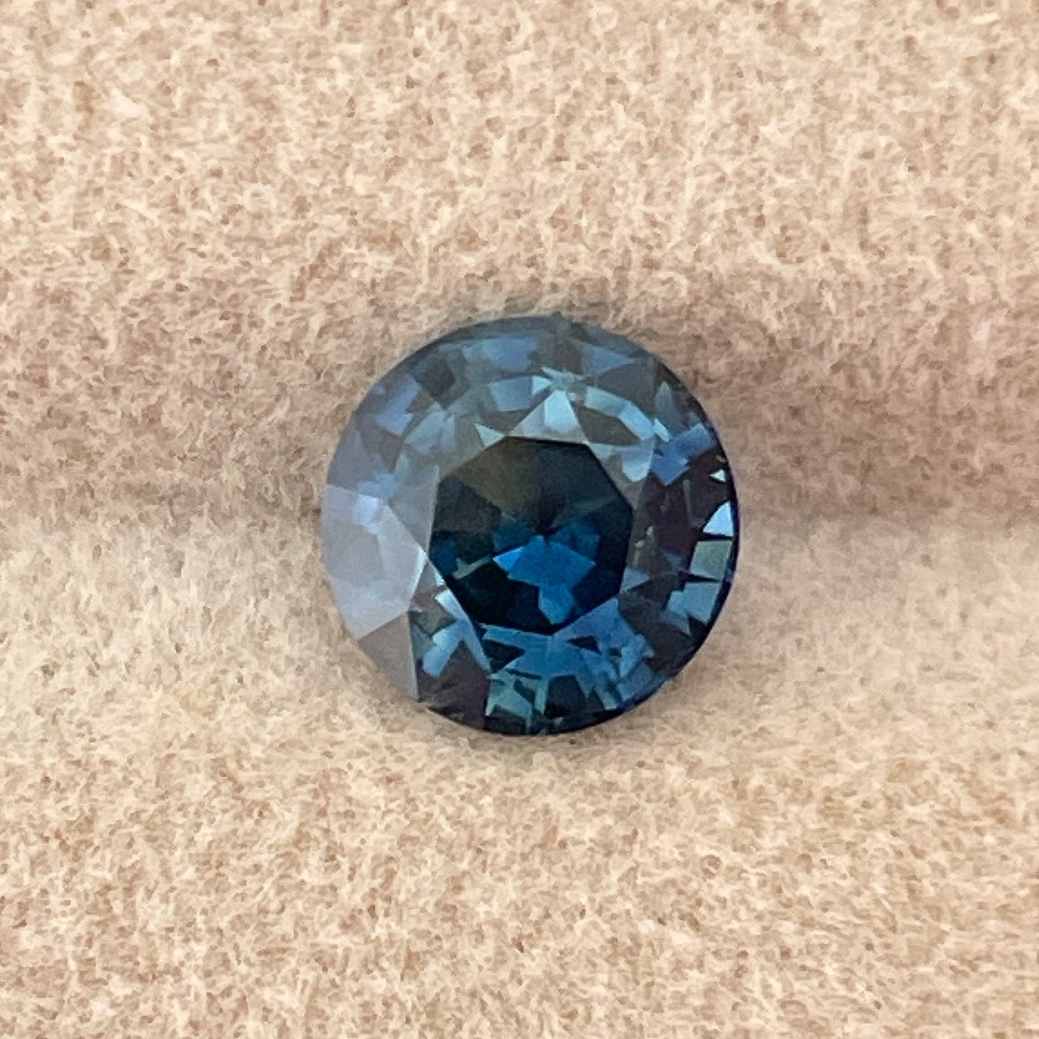 Teal blue sapphire loose gemstone, 1.65 carats, round cut, no heat, suitable for engagement rings or custom jewelry by NASHGEMS.