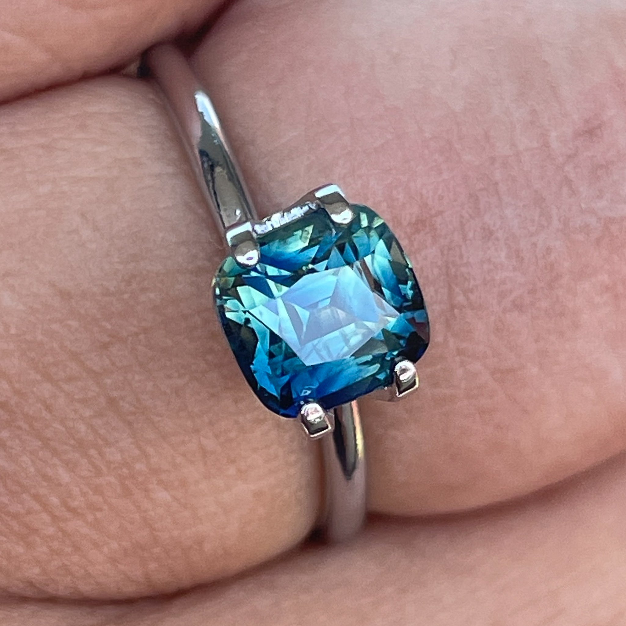 Teal Sapphire cushion cut 2.14 Ct from NASHGEMS, natural no heat blue-green loose sapphire ideal for engagement or custom jewelry.