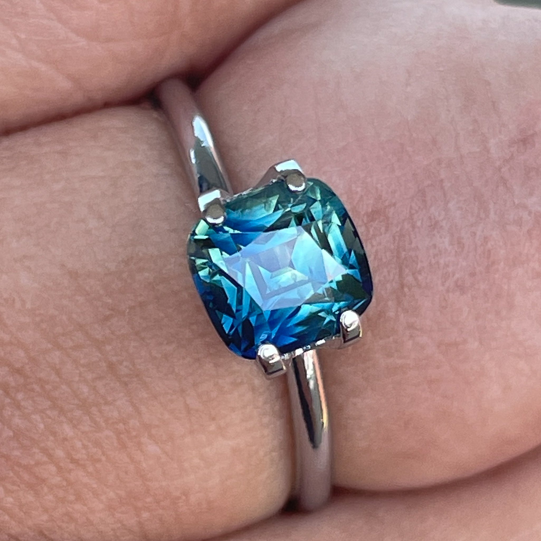 Natural blue-green cushion cut sapphire from NASHGEMS, 2.14 Ct teal sapphire for engagement rings or custom jewelry.