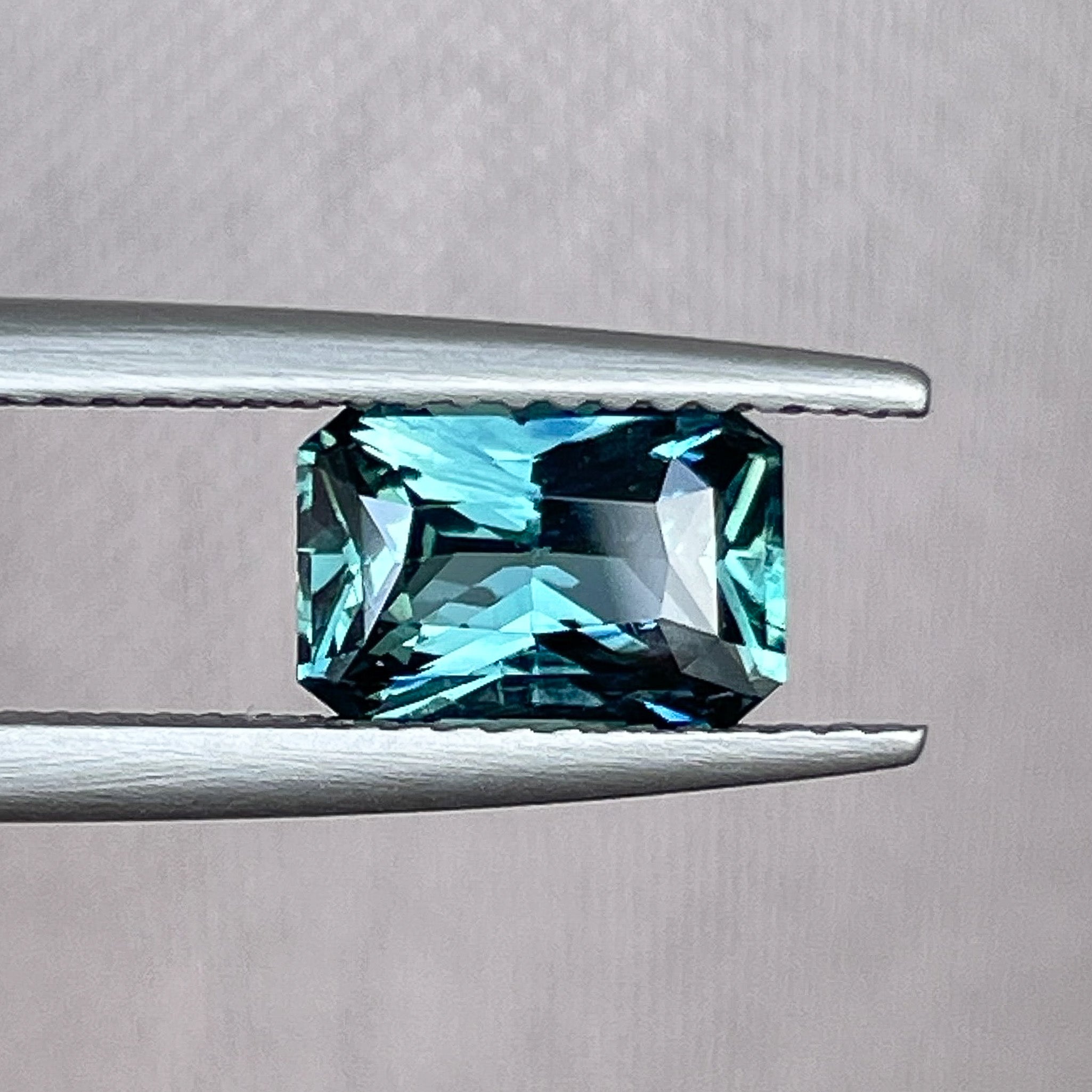 Natural teal blue-green sapphire, 1.71 carats, radiant cut, loose no-heat sapphire by NASHGEMS for jewelry or engagement.