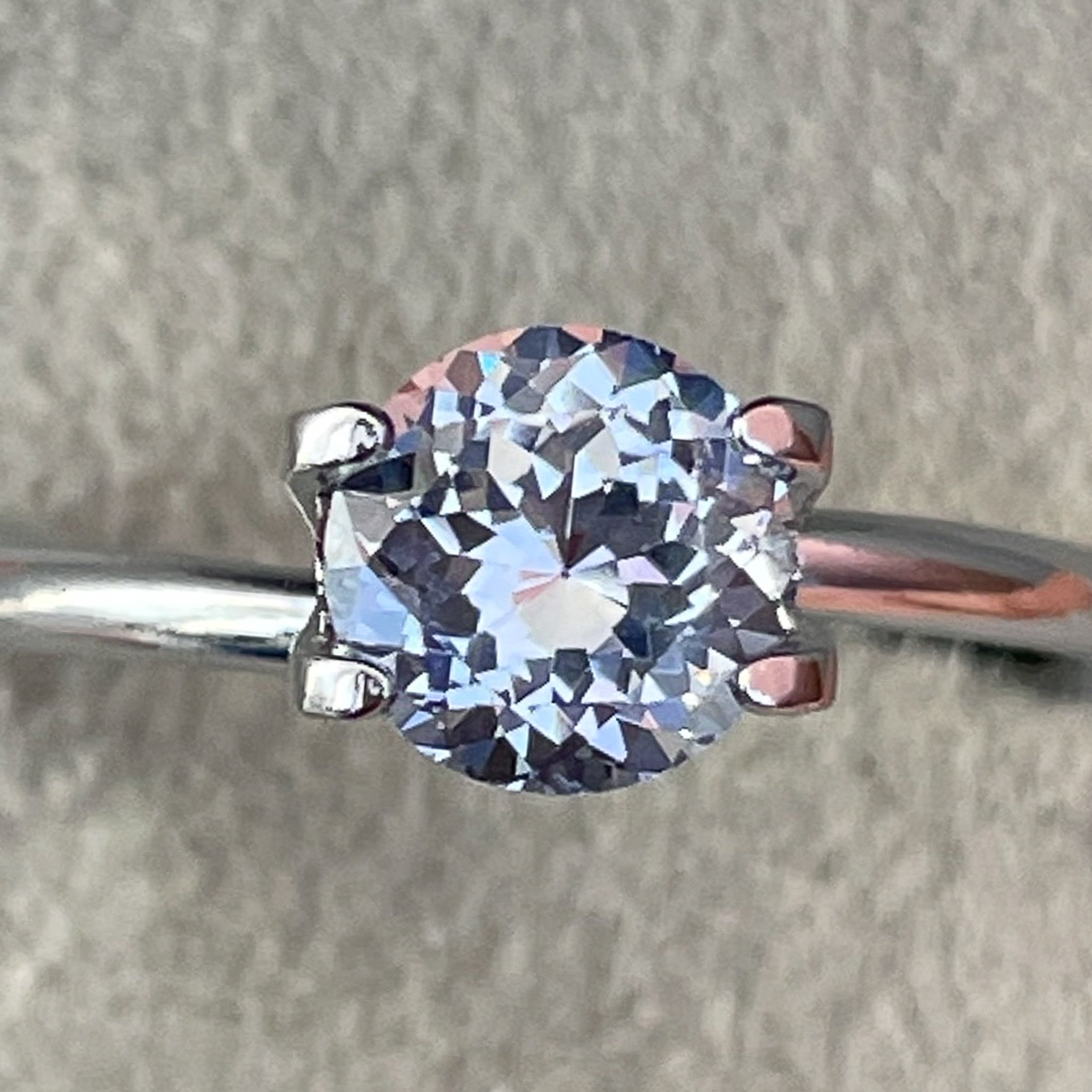 Natural Ceylon Pale Blue Sapphire, 1.30 Ct round cut loose gemstone by NASHGEMS for engagement rings.